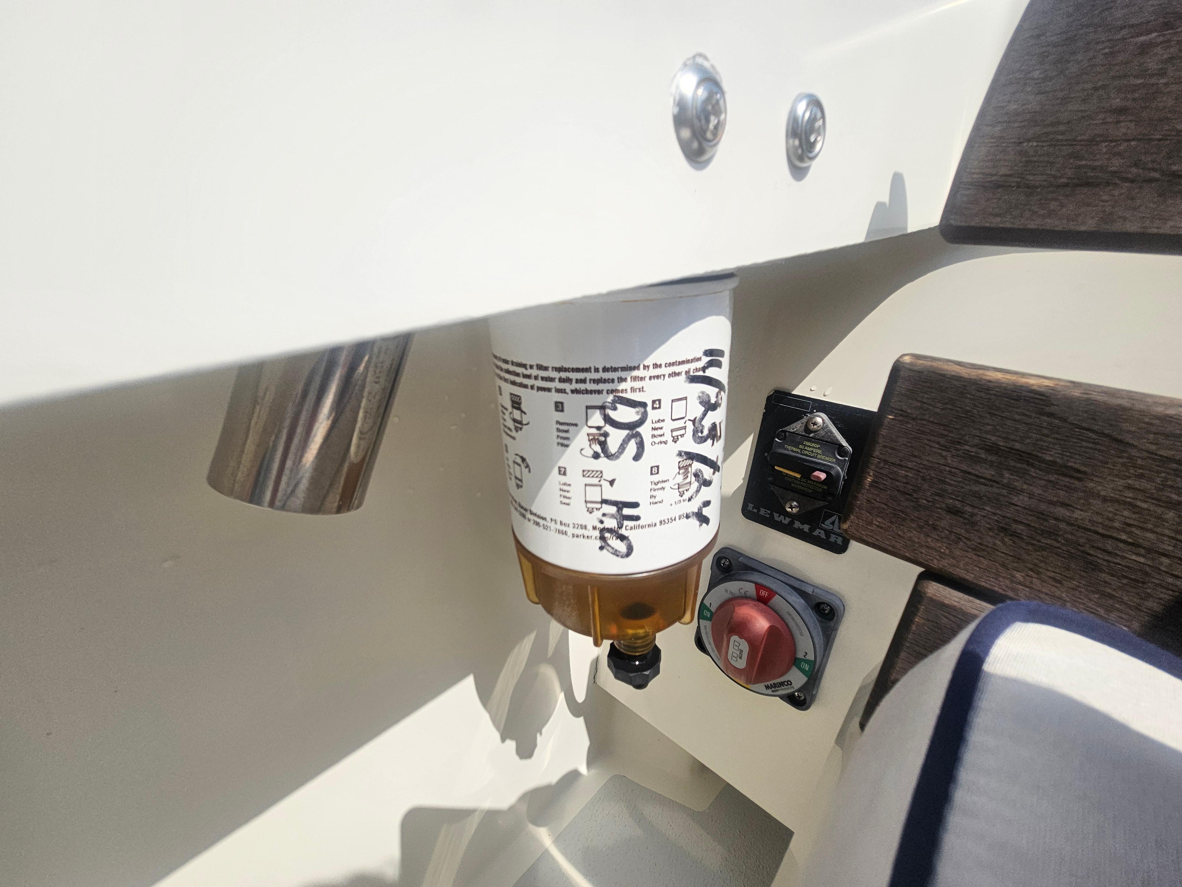 Fuel filter and switch panel on 2019 Eastern 248 Explorer boat.