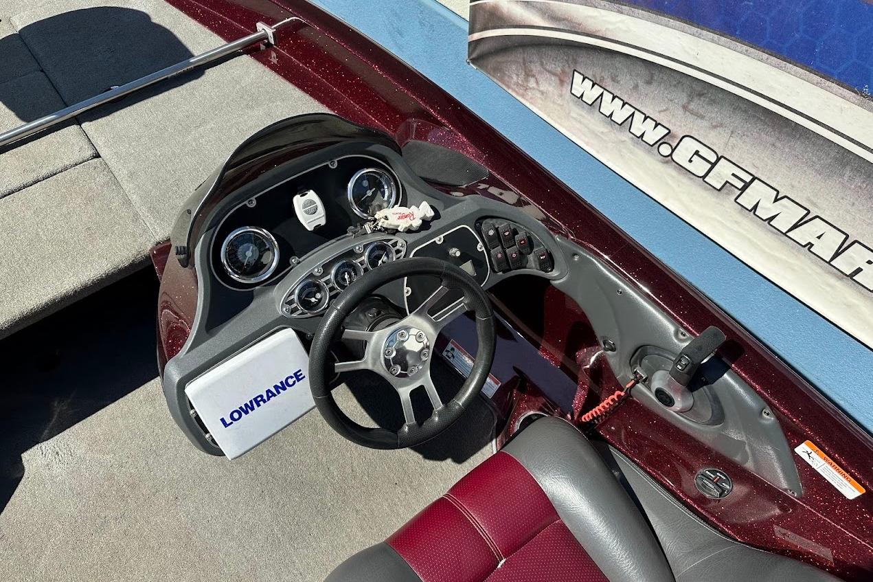 2010 Ranger 178 VS boat dashboard with Lowrance electronics and steering wheel.