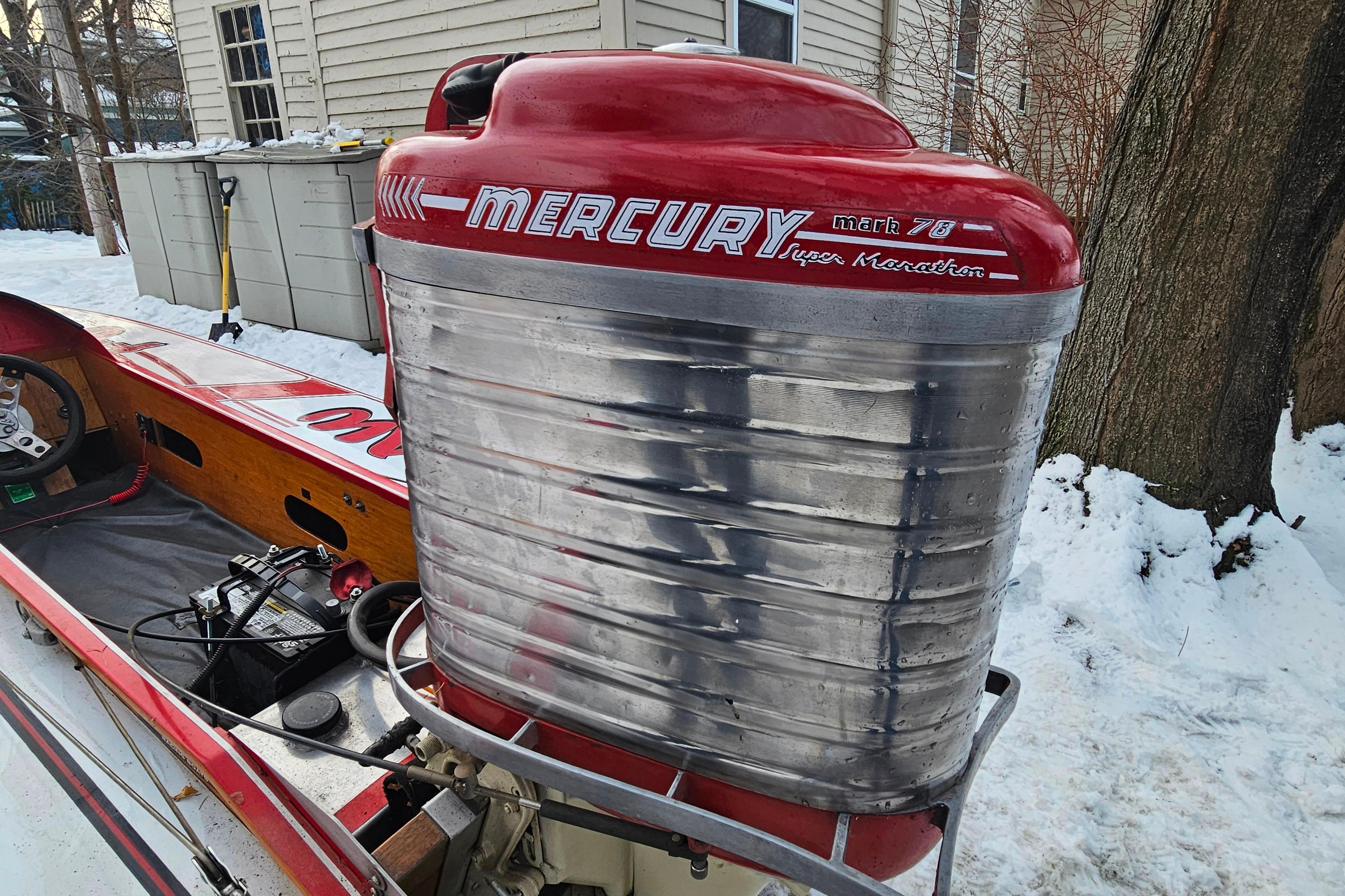 1987 De Silva F Class Race boat with Mercury Mark 78 engine in snowy setting.