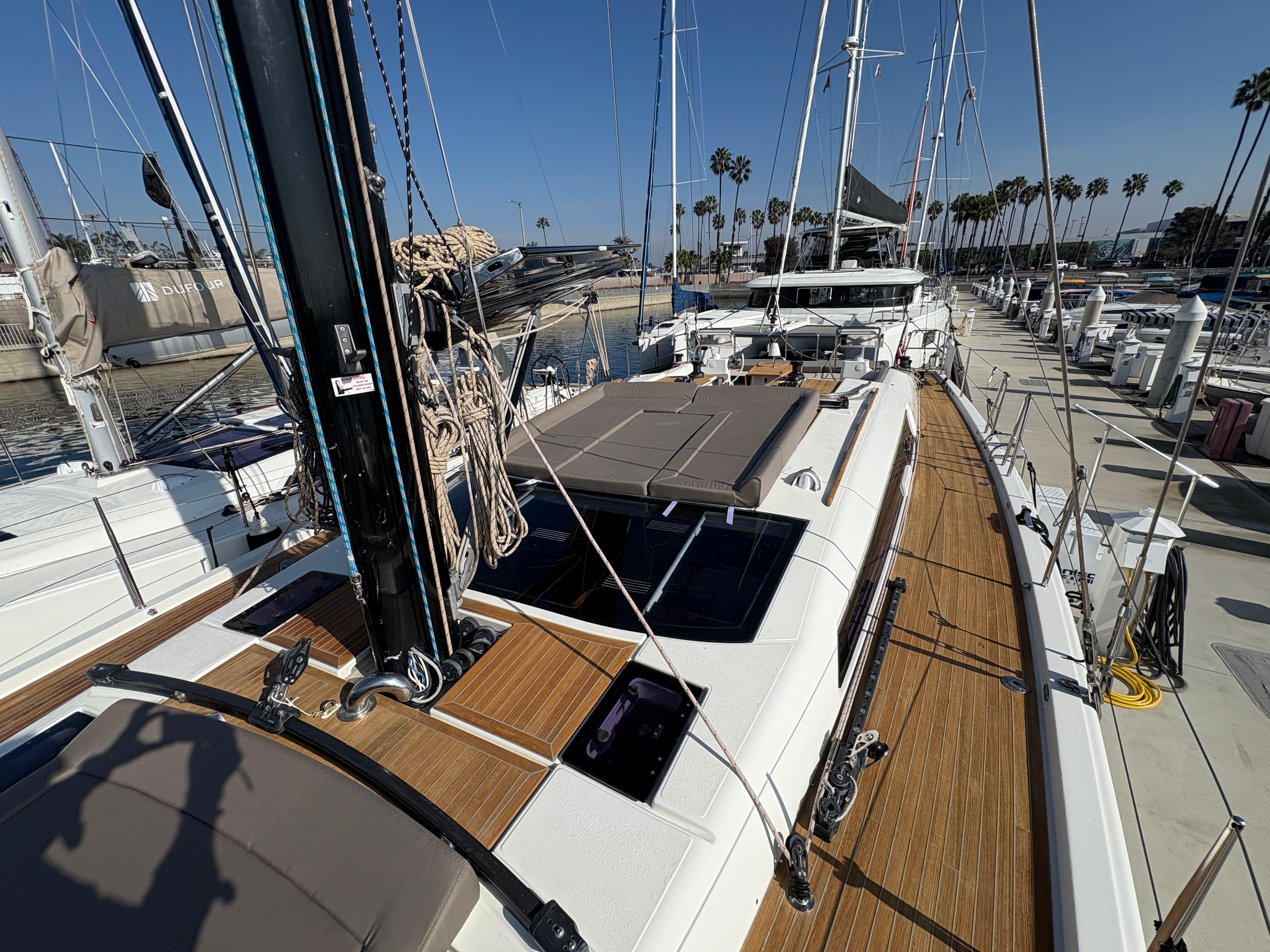 Dufour-560 Exclusive 2018-560 Exclusive US-2018 Dufour 560 Exclusive yacht docked, featuring sleek design and spacious deck.-9765971 | Thumbnail