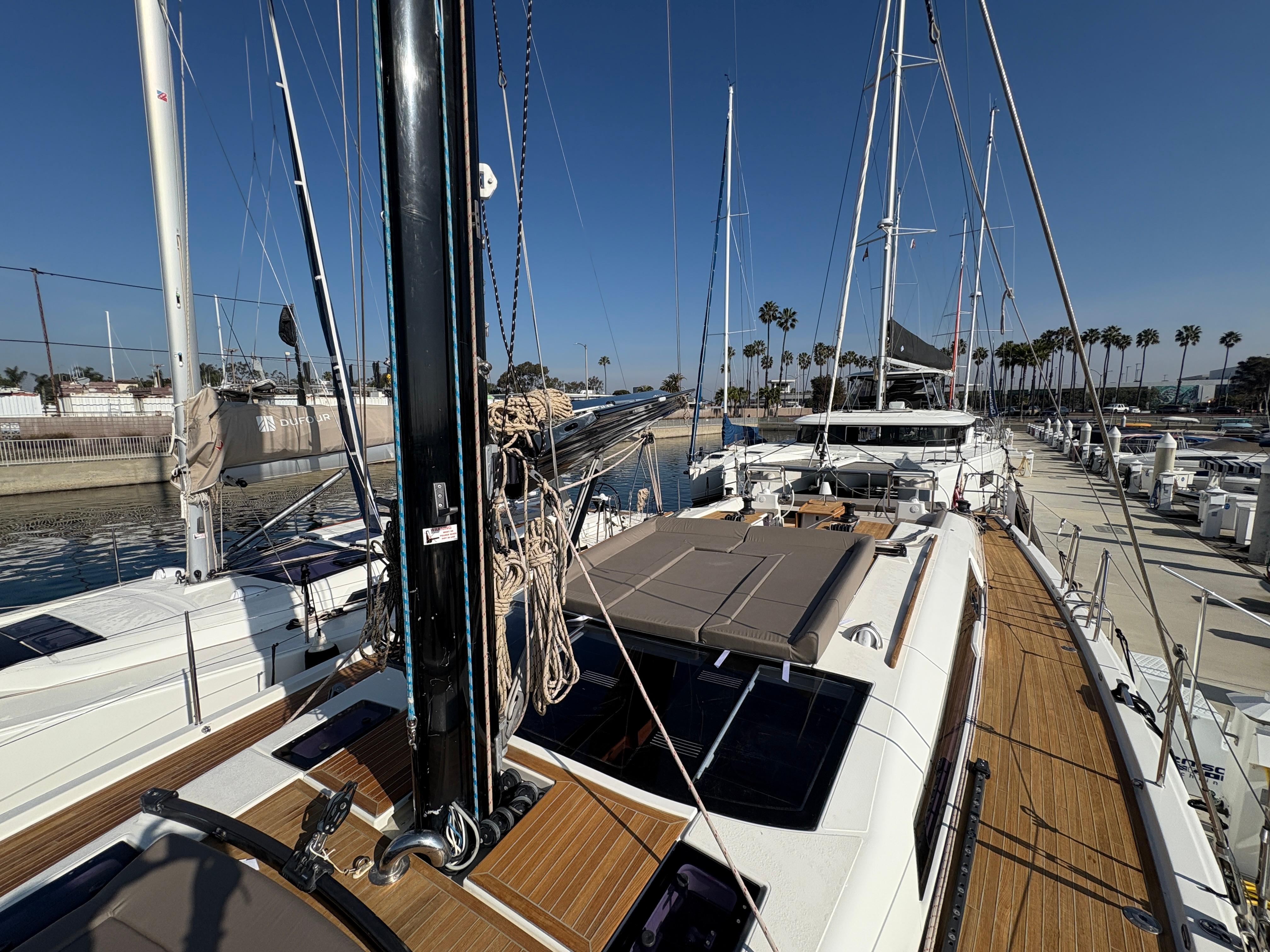 Dufour-560 Exclusive 2018-560 Exclusive US-2018 Dufour 560 Exclusive yacht docked, showcasing sleek design and spacious deck.-9765971 | Thumbnail