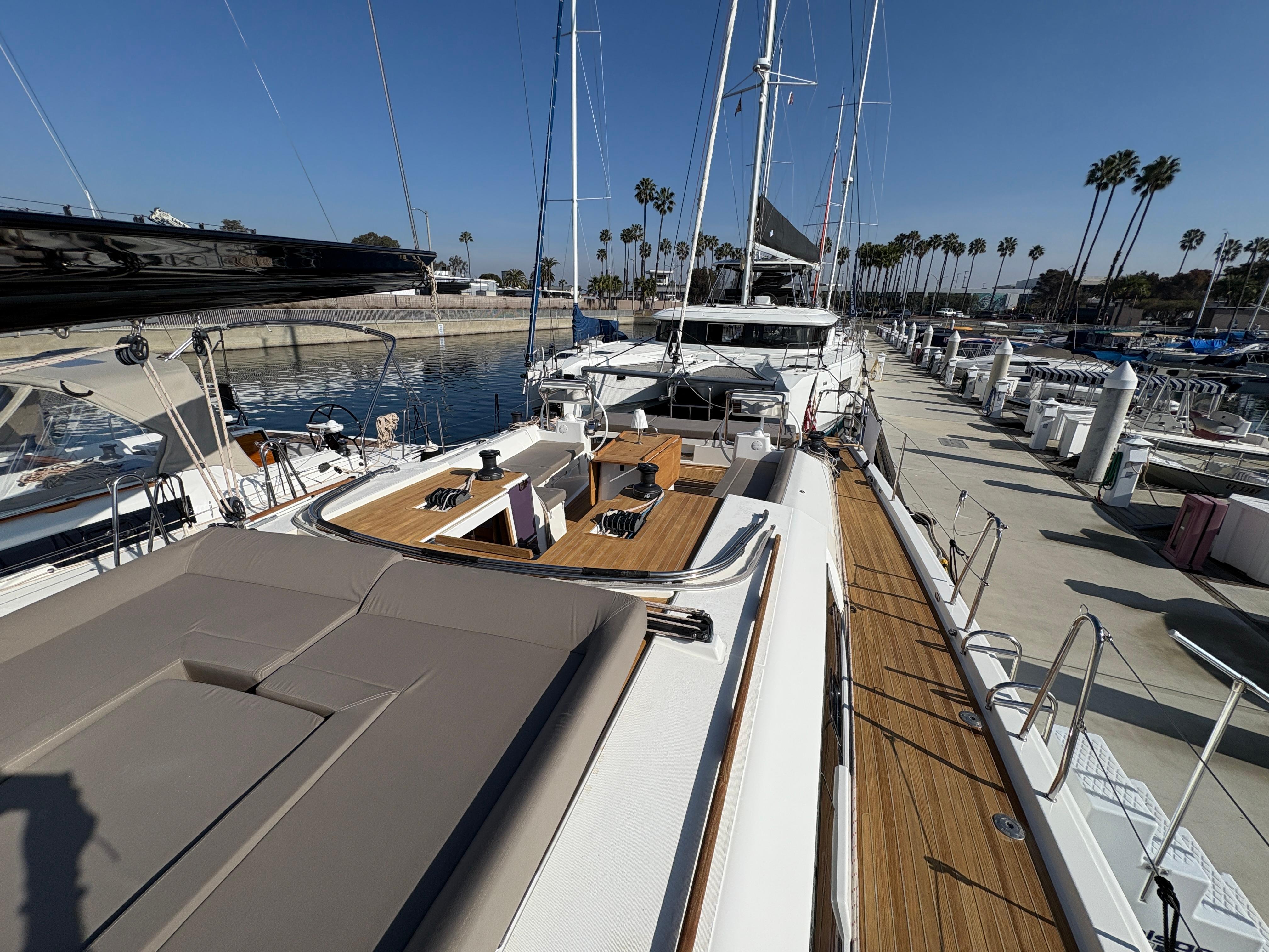 Dufour-560 Exclusive 2018-560 Exclusive US-2018 Dufour 560 Exclusive yacht docked at marina, showcasing spacious deck and sleek design.-9765971 | Thumbnail