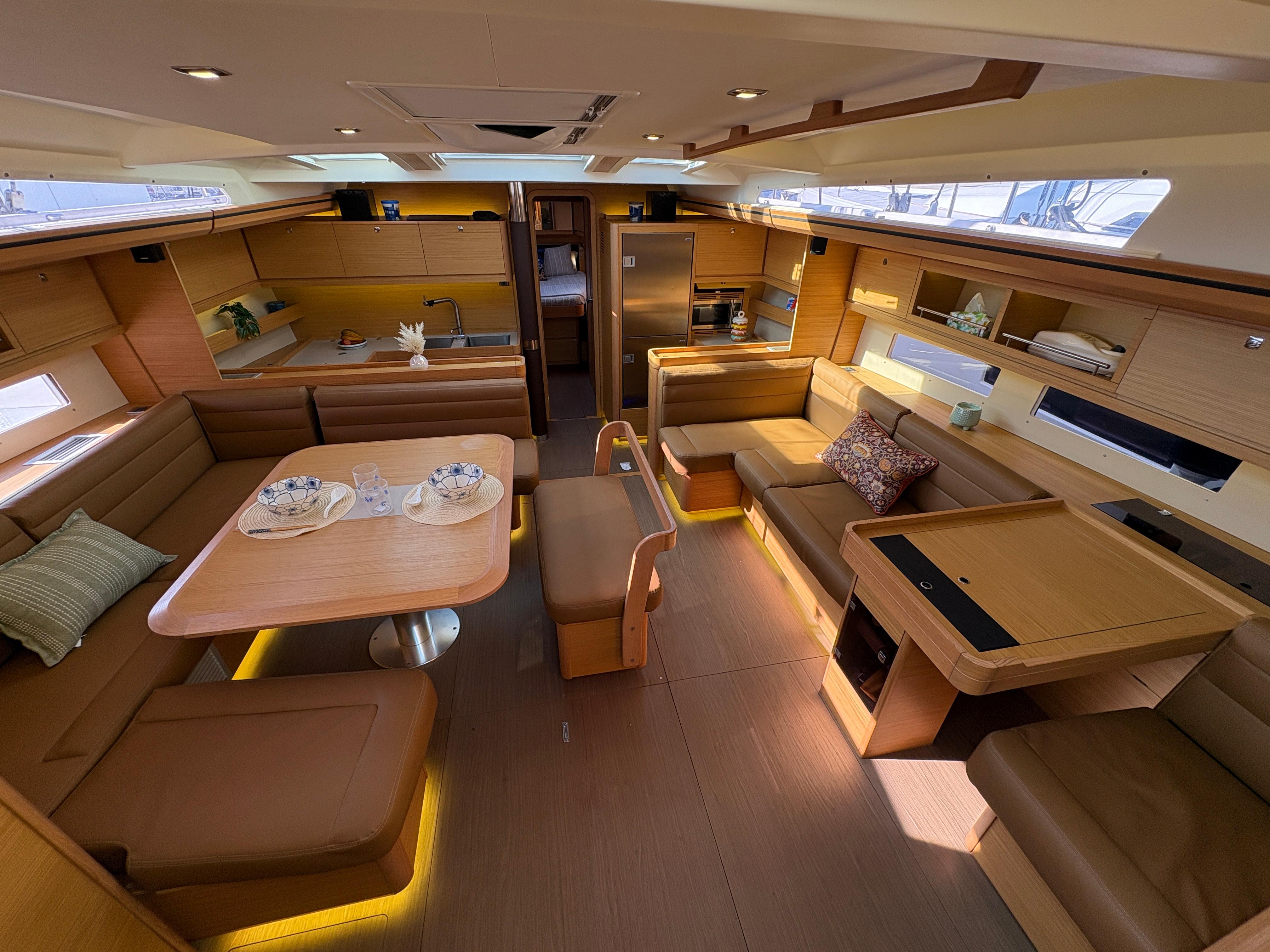 Dufour-560 Exclusive 2018-560 Exclusive US-Luxurious interior of 2018 Dufour 560 Exclusive yacht with elegant seating and dining area.-9765971 | Thumbnail
