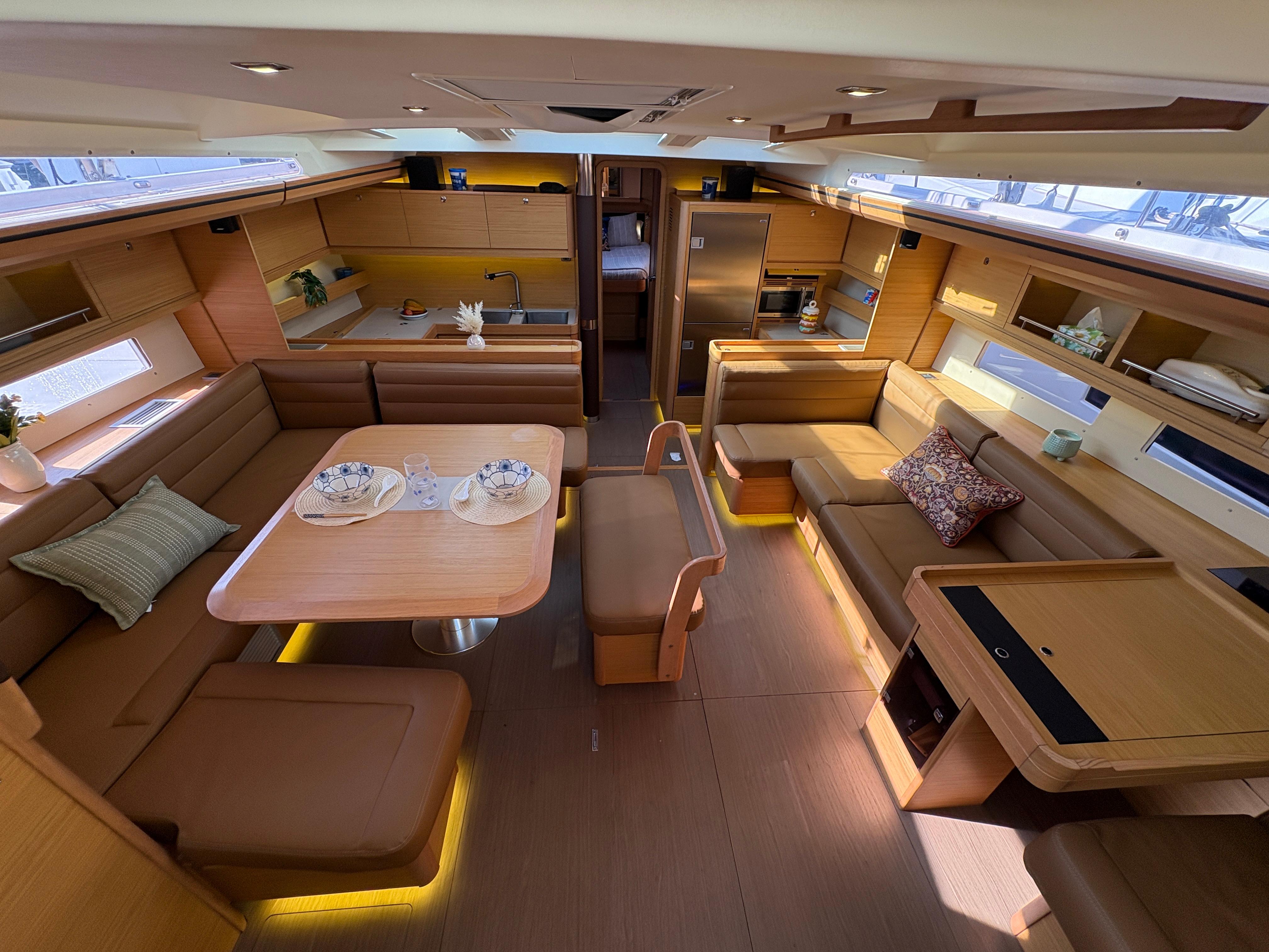 Dufour-560 Exclusive 2018-560 Exclusive US-Luxurious interior of 2018 Dufour 560 Exclusive yacht with elegant seating and dining area.-9765971 | Thumbnail