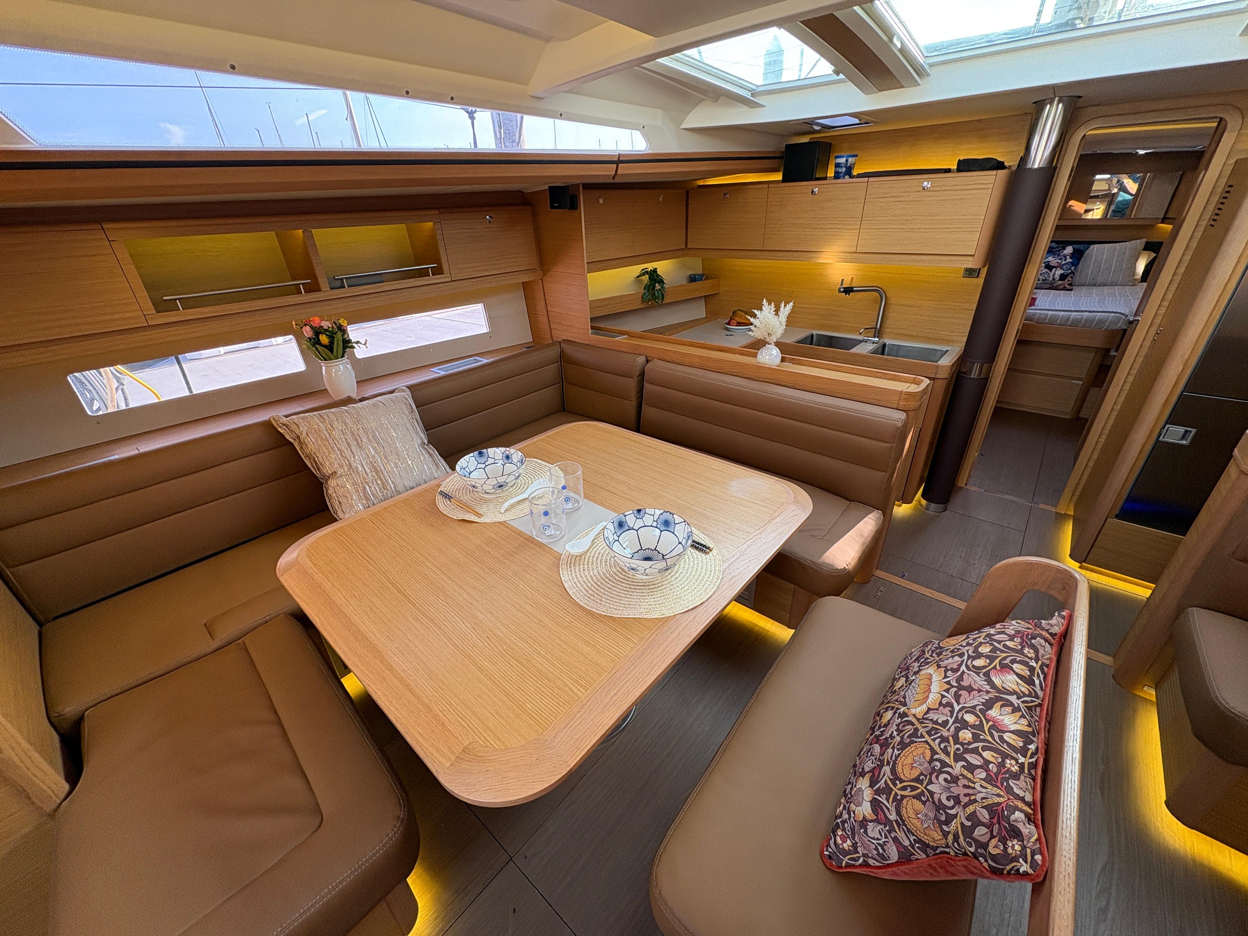 Dufour-560 Exclusive 2018-560 Exclusive US-Luxurious interior of 2018 Dufour 560 Exclusive yacht with elegant seating and modern kitchen.-9765971 | Thumbnail
