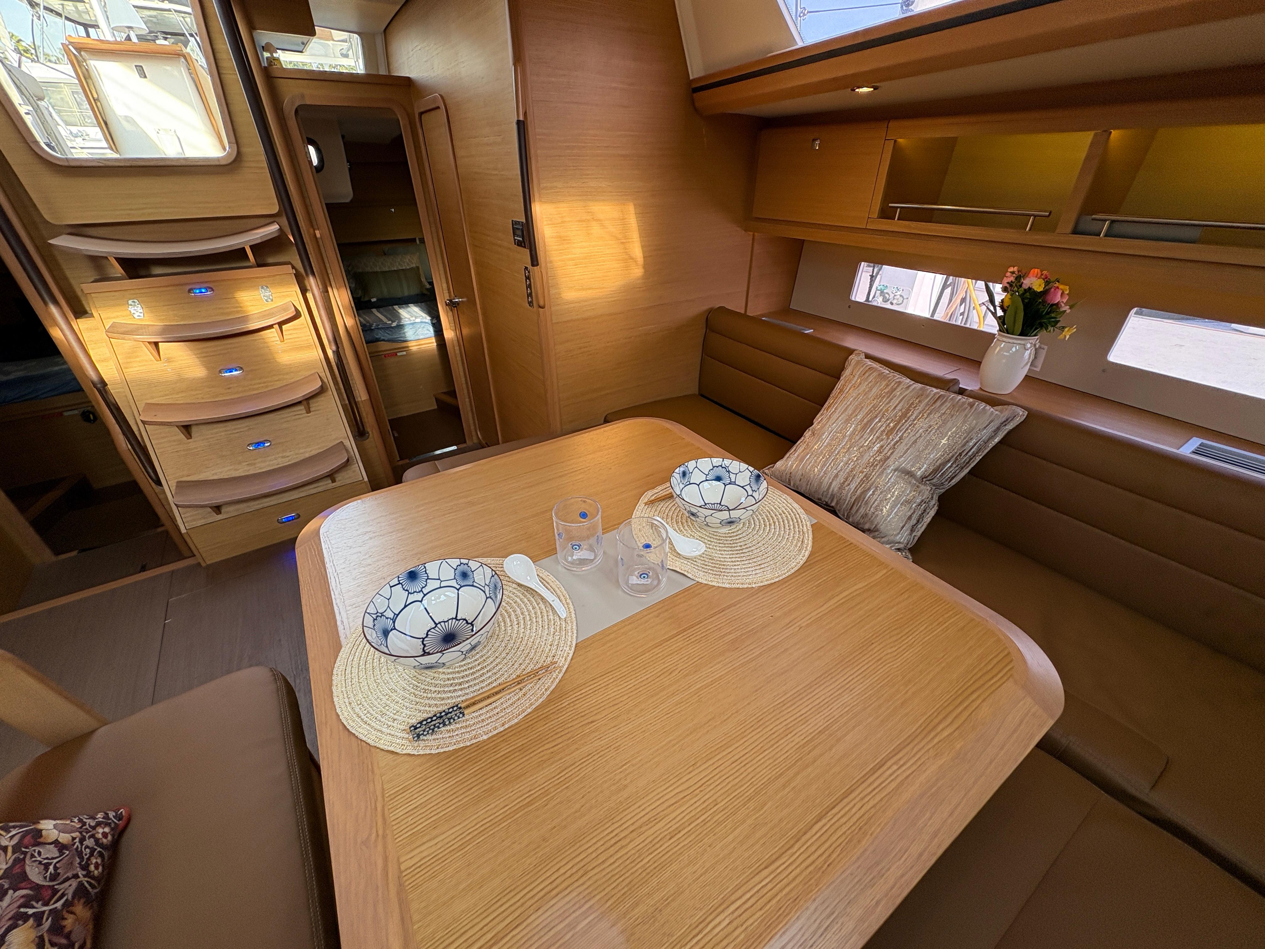 Dufour-560 Exclusive 2018-560 Exclusive US-Luxurious interior of 2018 Dufour 560 Exclusive yacht with elegant dining setup.-9765971 | Thumbnail