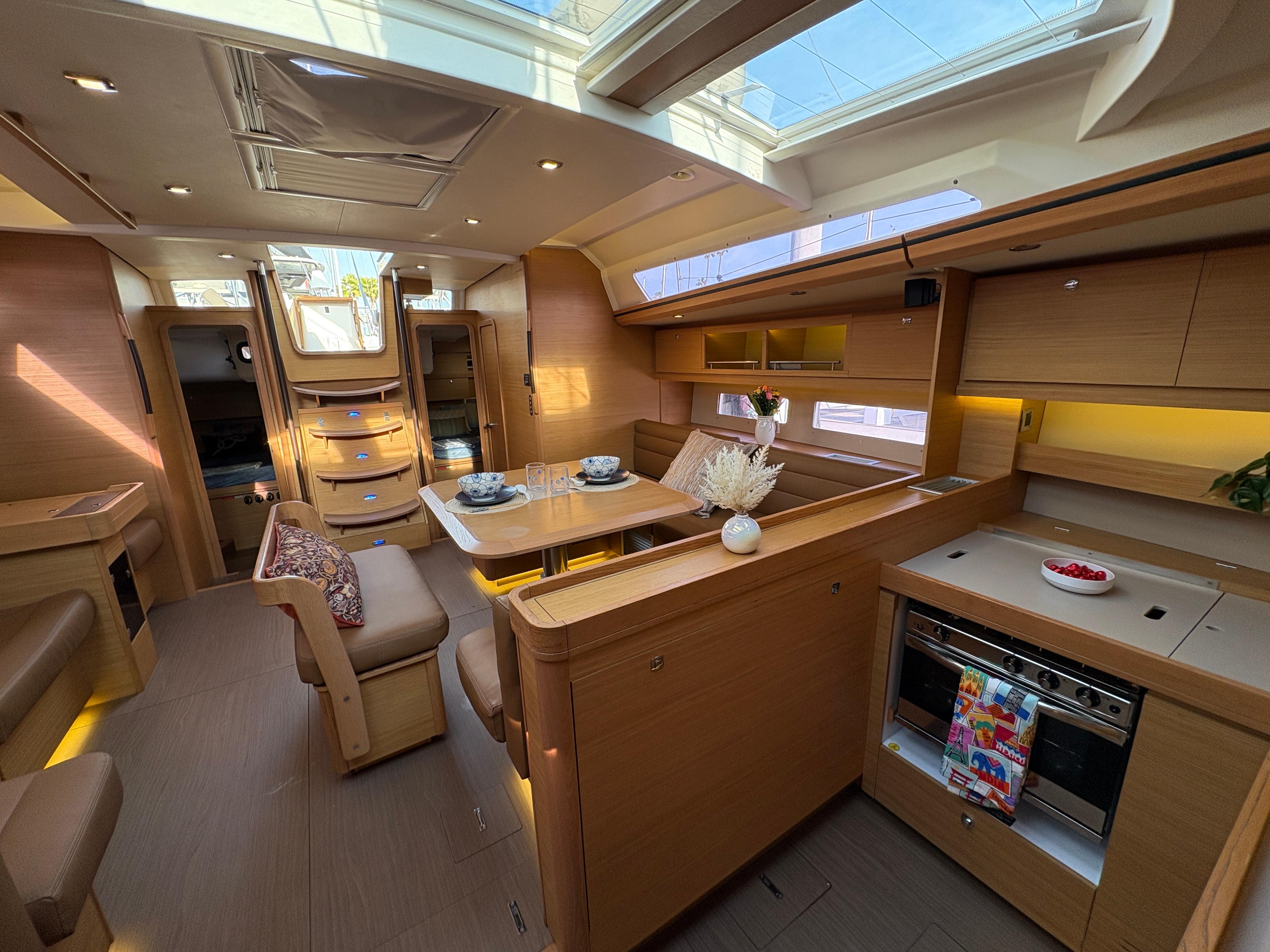 Dufour-560 Exclusive 2018-560 Exclusive US-Luxurious interior of 2018 Dufour 560 Exclusive yacht with modern kitchen and dining area.-9765971 | Thumbnail