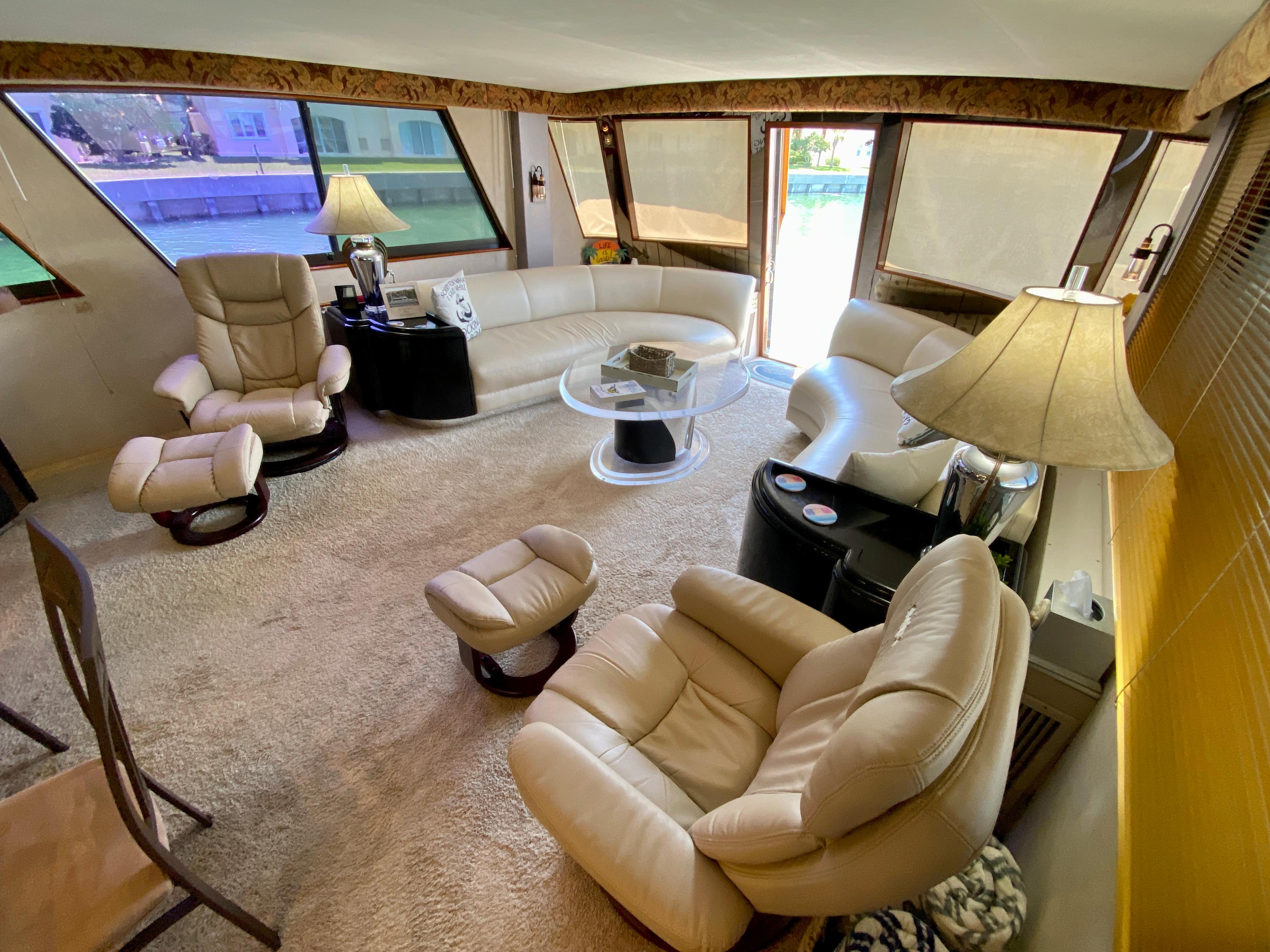 Hatteras 70 Conundrum - Salon, Port and Starboard Seating, with Table