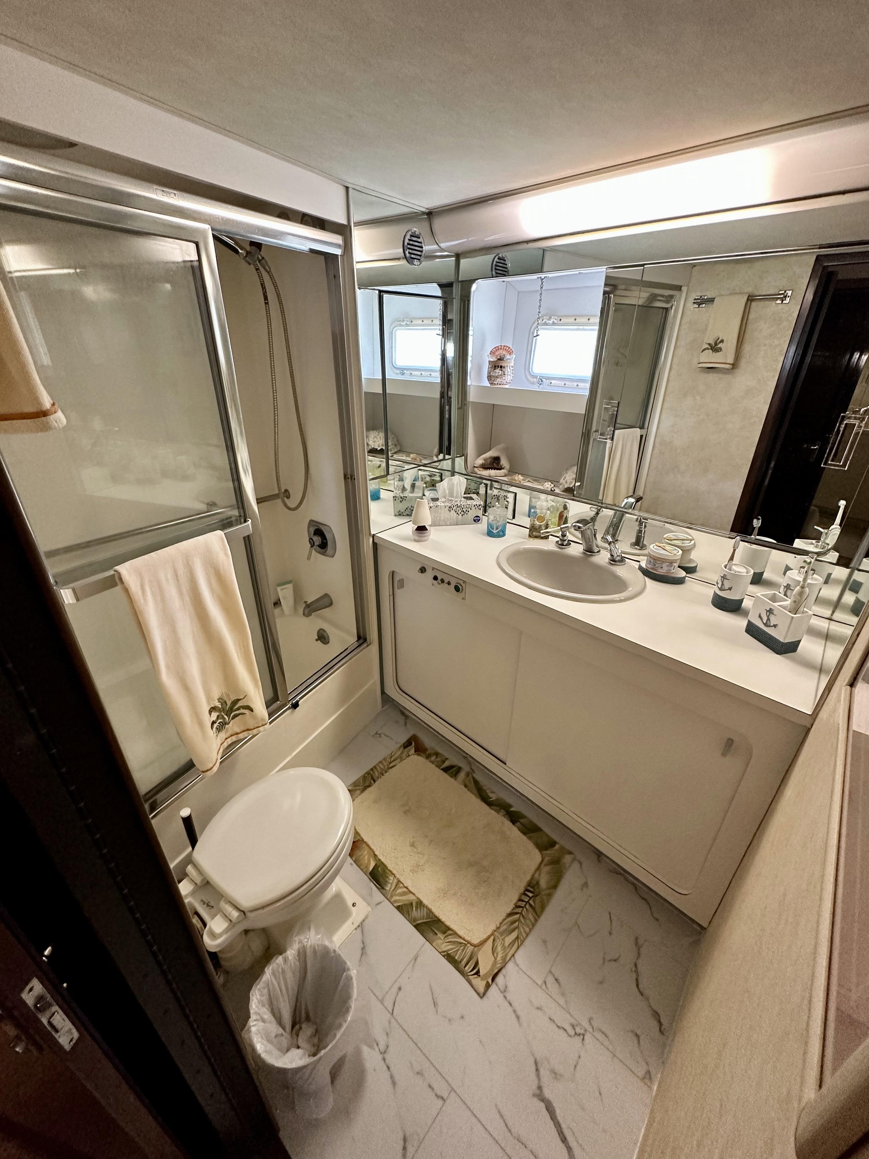 Hatteras 70 Conundrum - Master Stateroom, Shower with Tub, Sink and Vanity