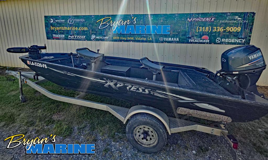 2008 Xpress XP16PF Stick-Steer boat on trailer at Bryan's Marine dealership.