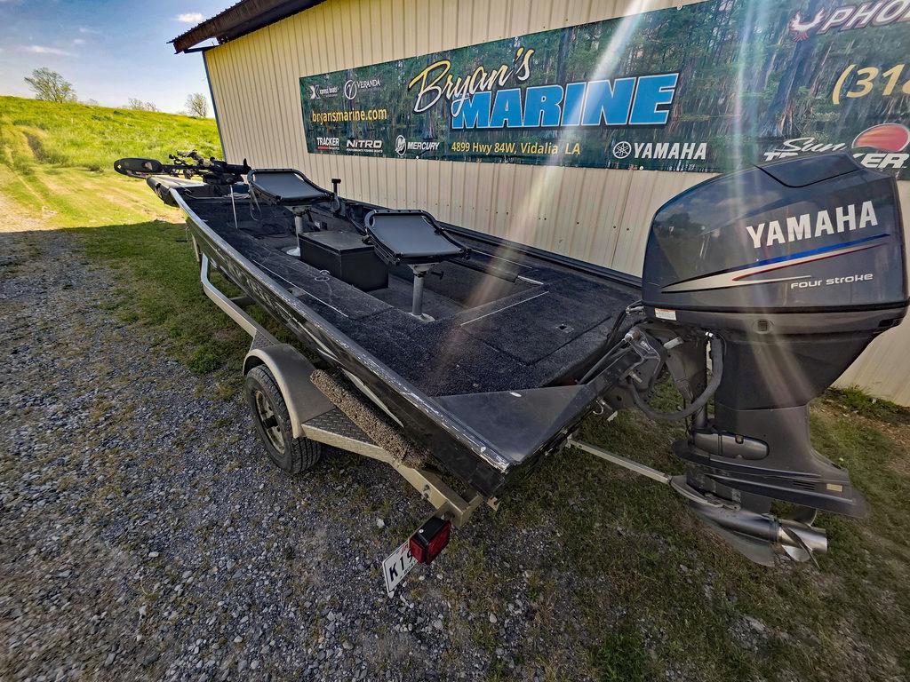 2008 Xpress XP16PF Stick-Steer boat with Yamaha motor, parked outside Bryan's Marine.