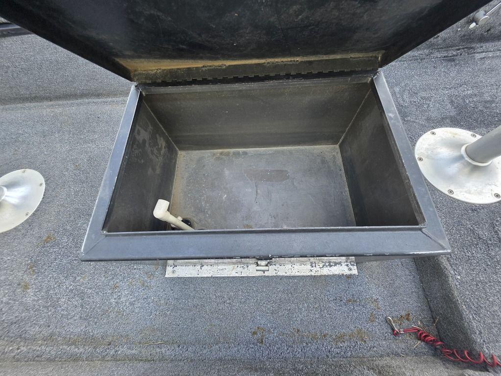 Open storage compartment on 2008 Xpress XP16PF Stick-Steer boat.