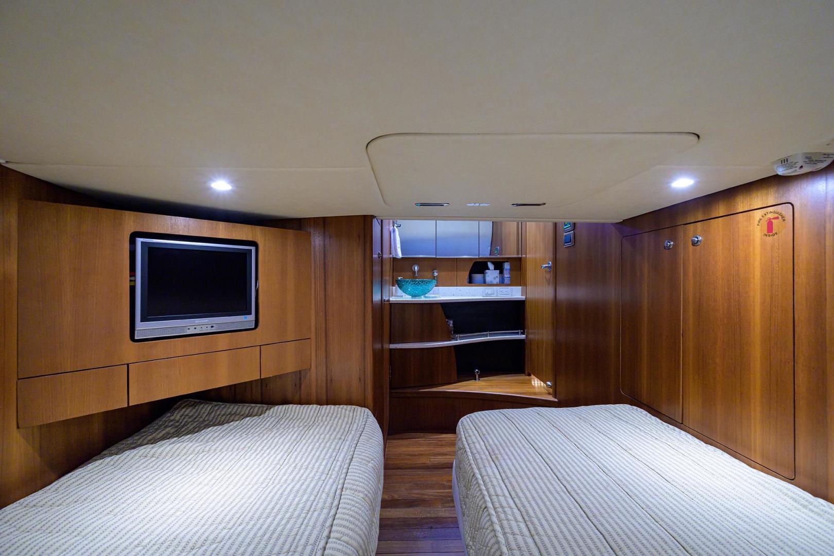 Tiara 43  Perfect Union II - Guest Stateroom twin berths and TV