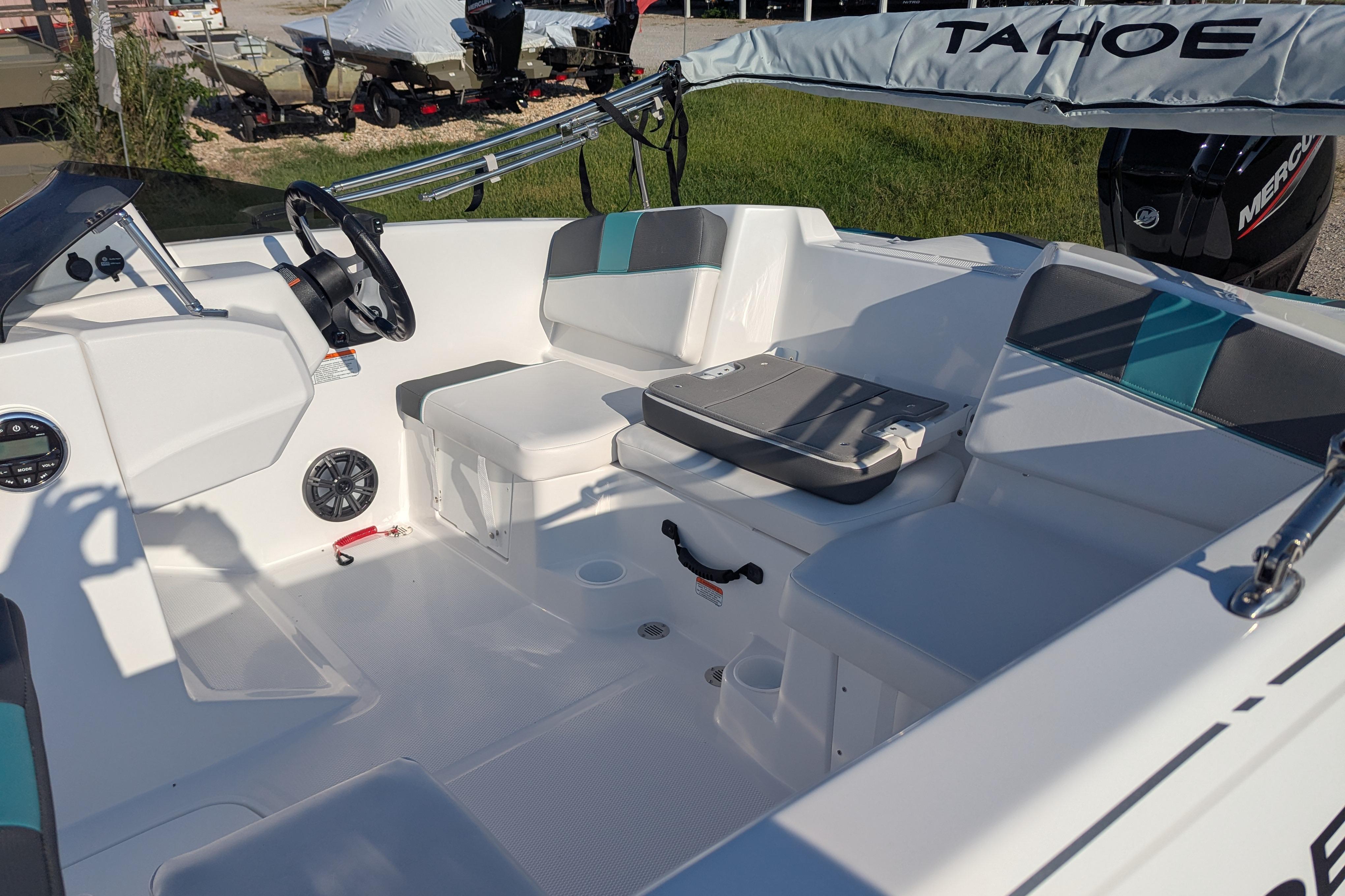2026 Tahoe T16 boat interior with seating, steering wheel, and modern design.