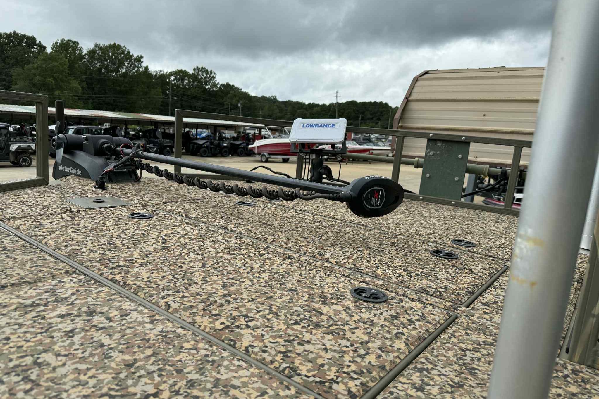 2022 Tracker Grizzly 2072 CC Sportsman boat with MotorGuide trolling motor and Lowrance equipment.