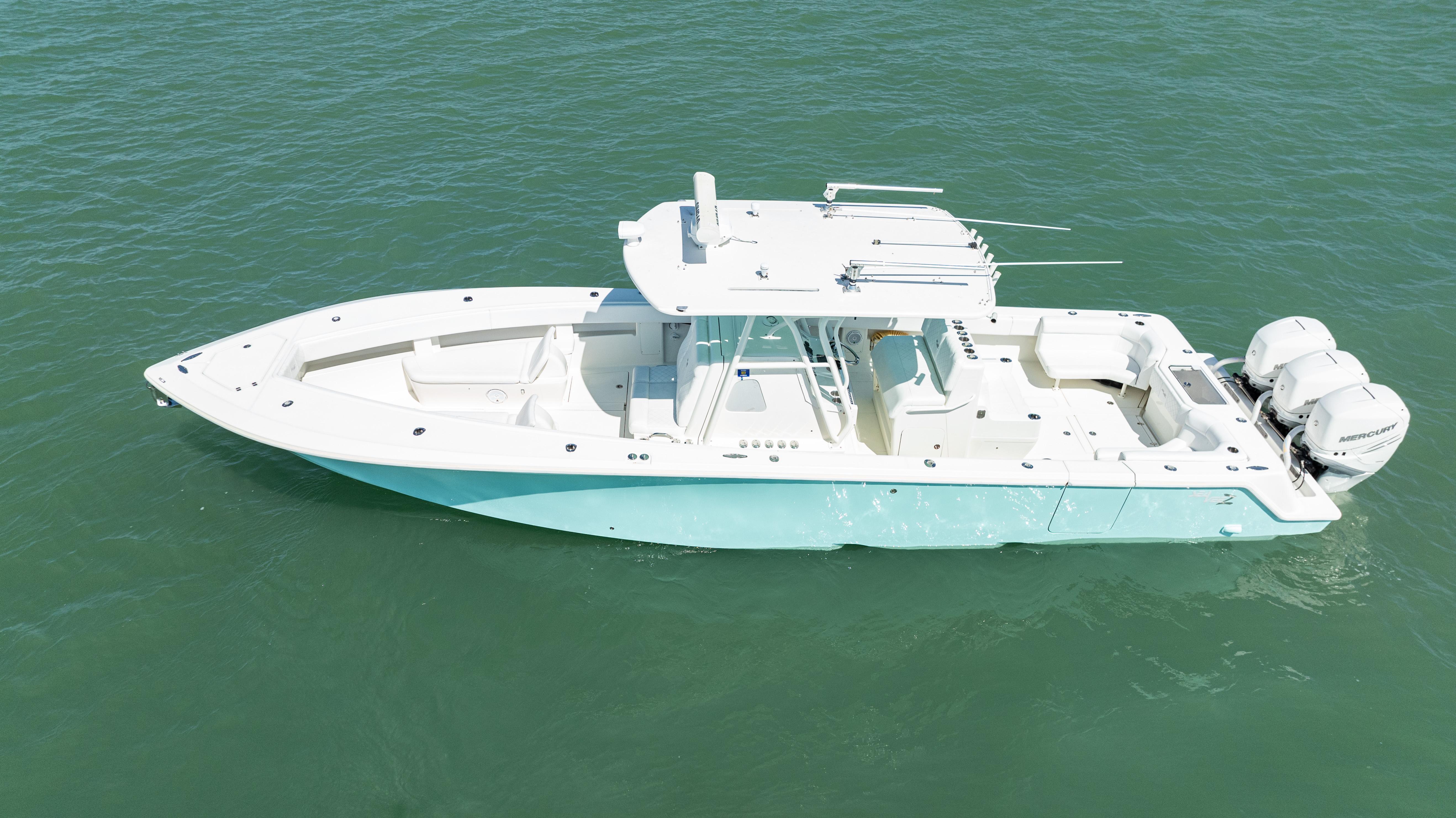 SeaVee-390Z 2015 -FL-US-2015 SeaVee 390Z boat on open water, featuring a sleek design and triple outboard engines.-9766060 | Thumbnail