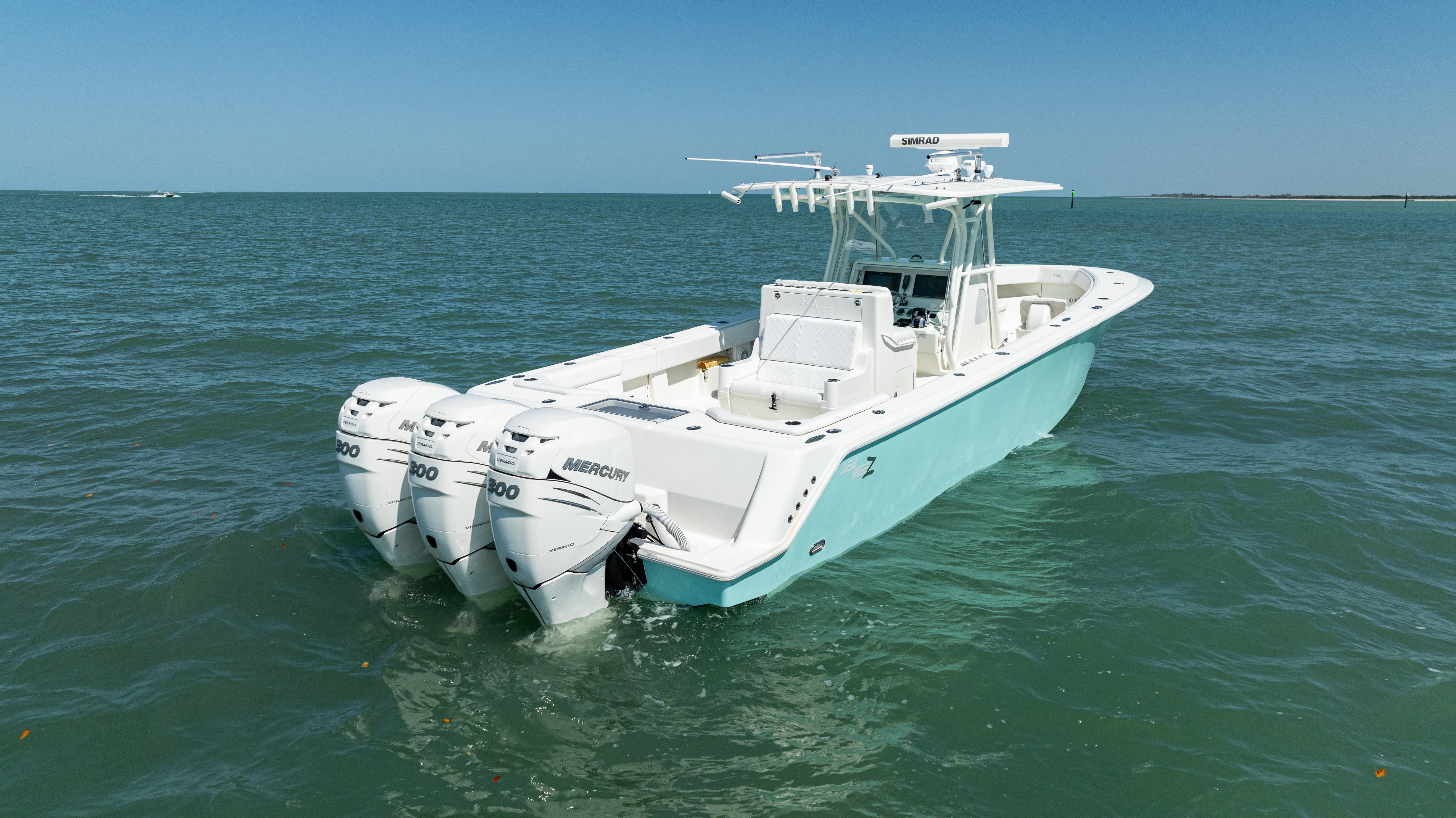 SeaVee-390Z 2015 -FL-US-2015 SeaVee 390Z boat with triple outboard engines on open water.-9766060 | Thumbnail