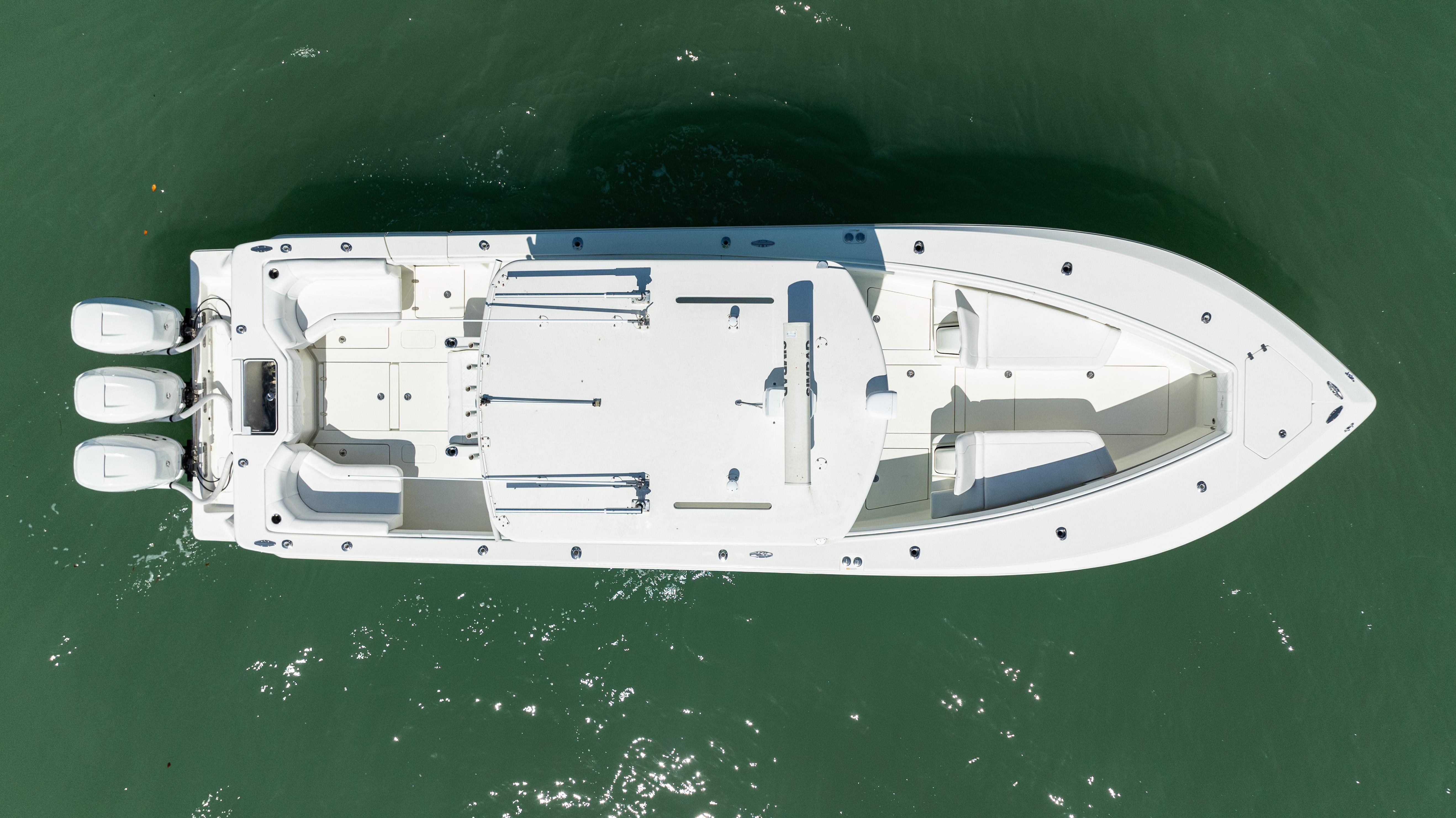 SeaVee-390Z 2015 -FL-US-Aerial view of 2015 SeaVee 390Z boat on water with triple engines.-9766060 | Thumbnail