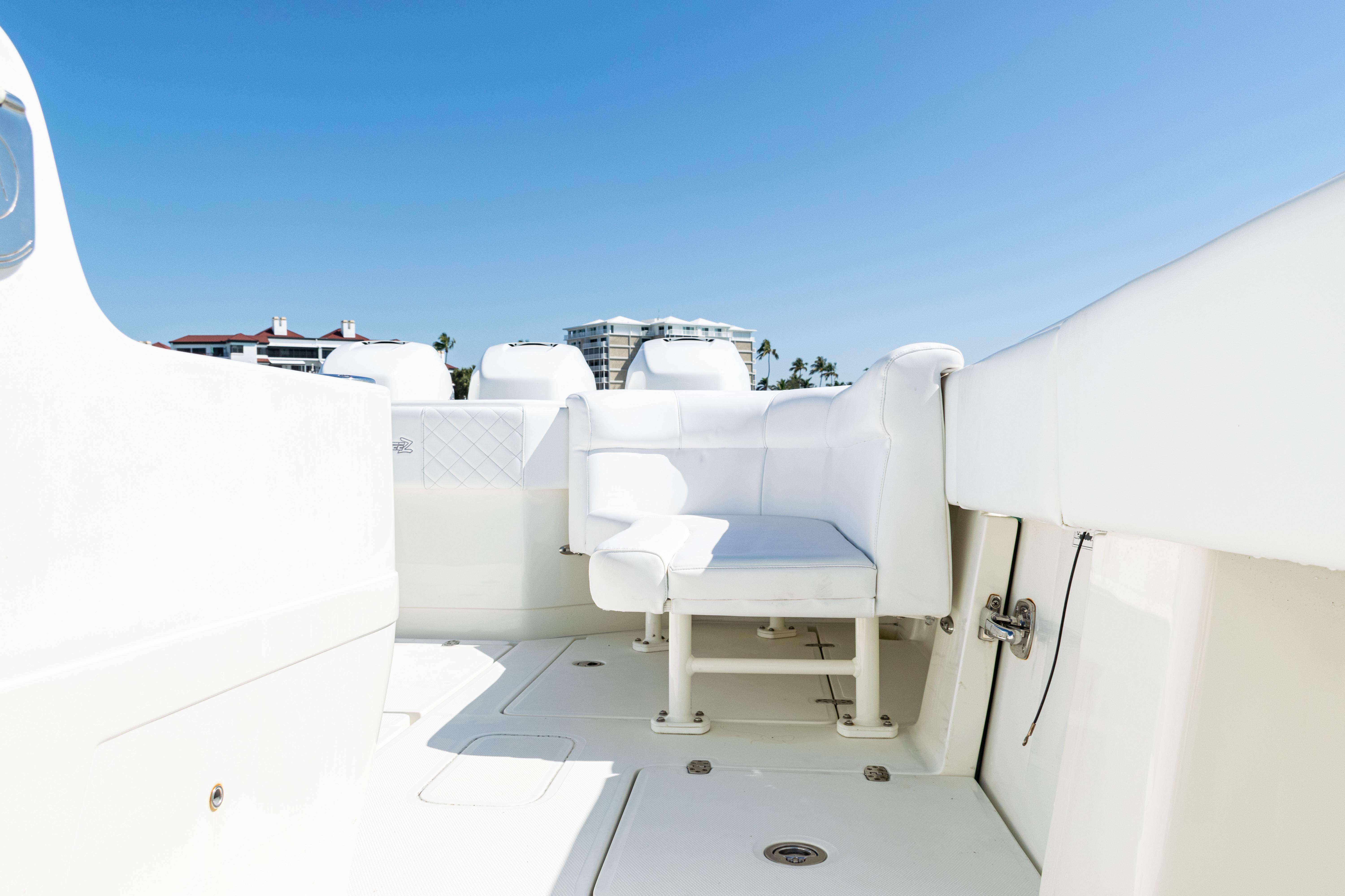 SeaVee-390Z 2015 -FL-US-2015 SeaVee 390Z boat interior with white seating and clear blue sky.-9766060 | Thumbnail