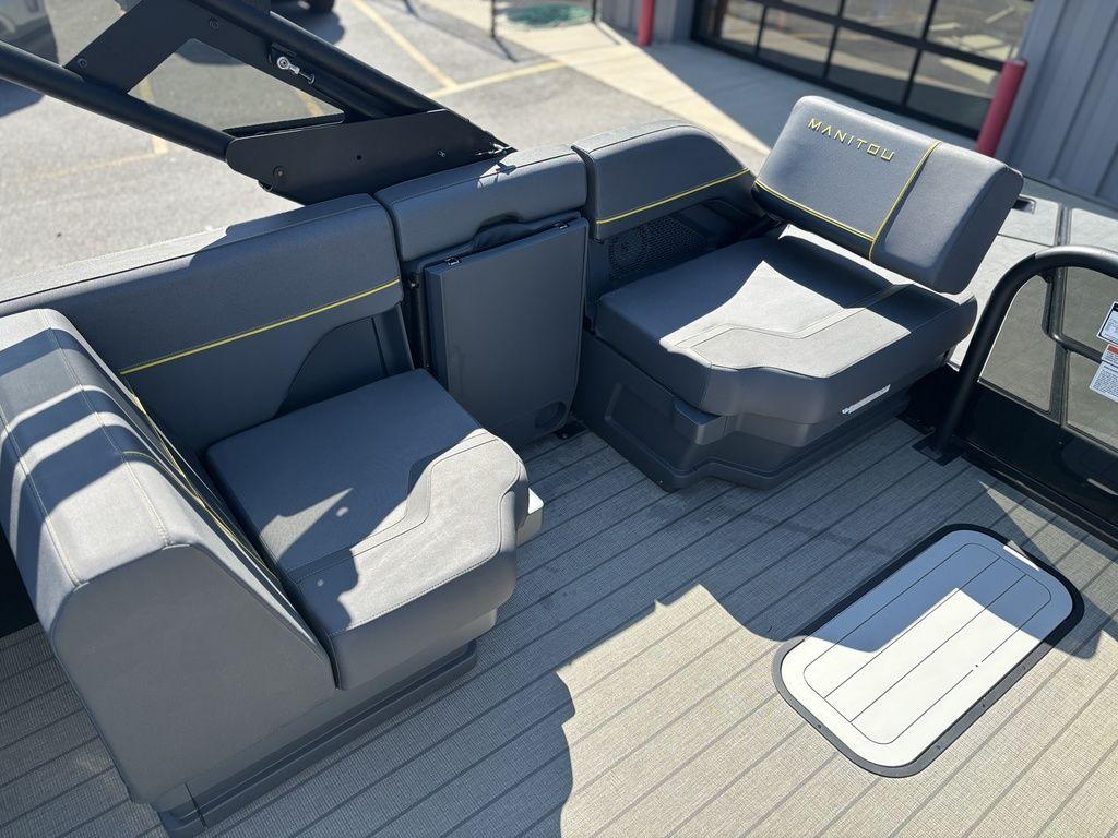 2023 Manitou Explore 22 Max Bench interior with gray seating and modern design.