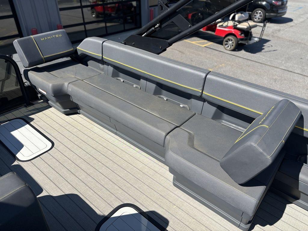 2023 Manitou Explore 22 Max Bench with sleek gray seating and modern design.