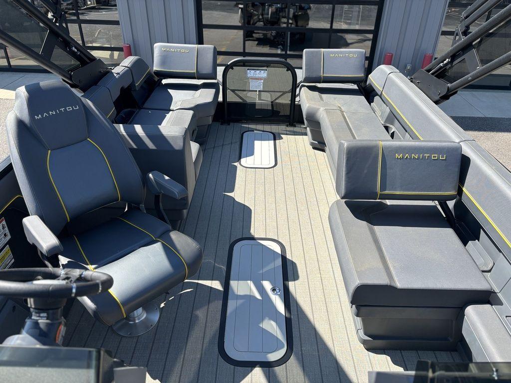 2023 Manitou Explore 22 Max Bench interior with gray seating and modern design.