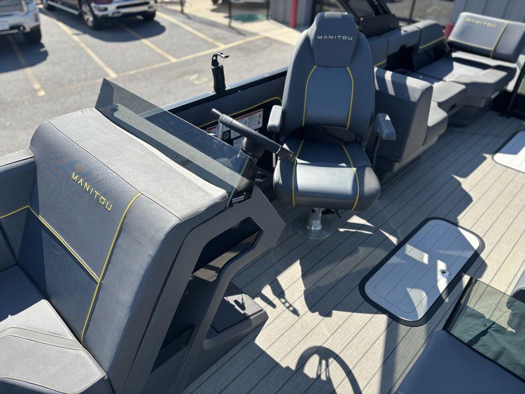 2023 Manitou Explore 22 Max Bench boat interior with sleek seating and modern design.