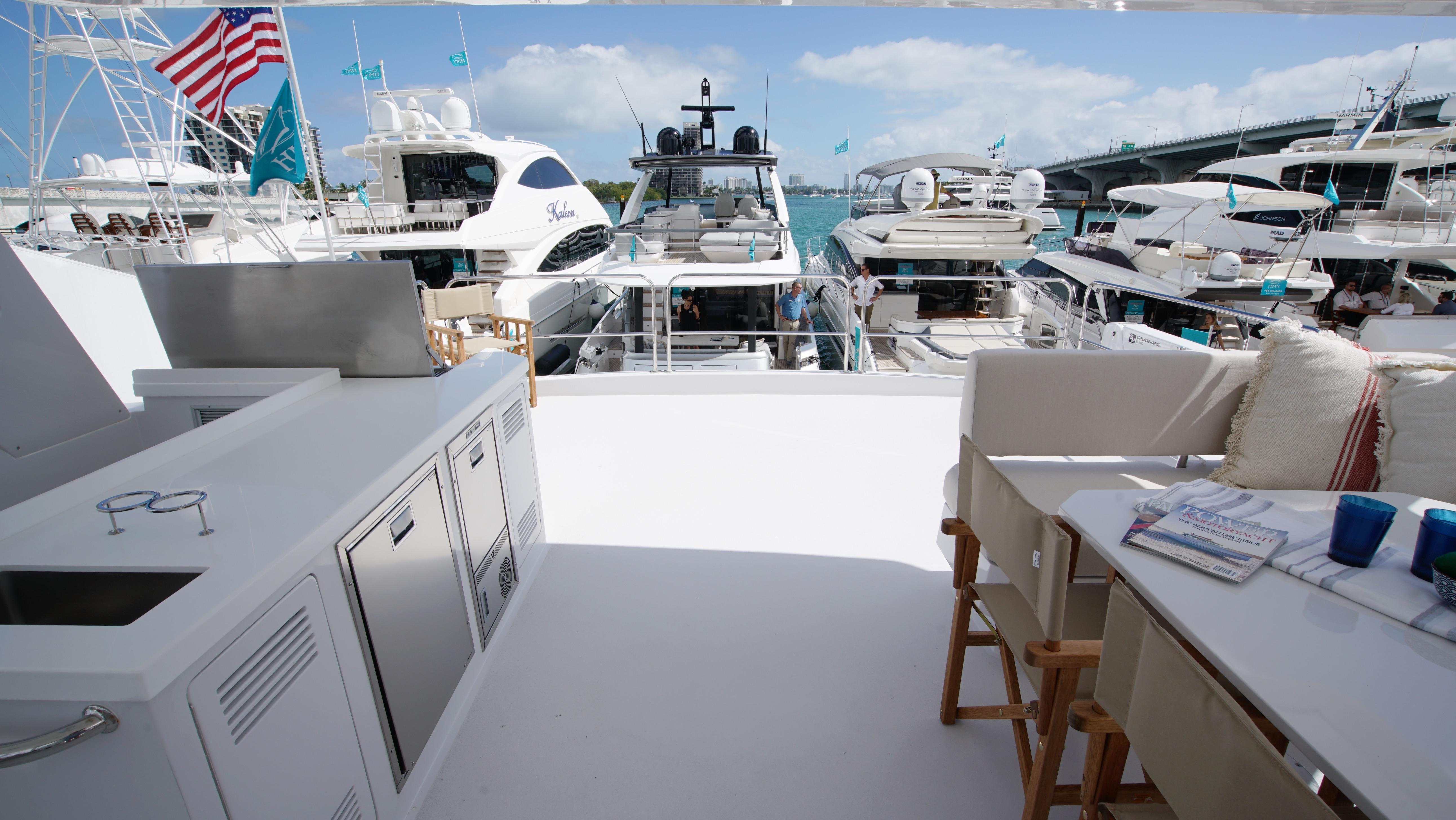 Two Oceans-555  008 2025 -FL-US-Luxury yacht deck with seating and kitchenette, Two Oceans 555  008, 2025 model.-9676126 | Thumbnail