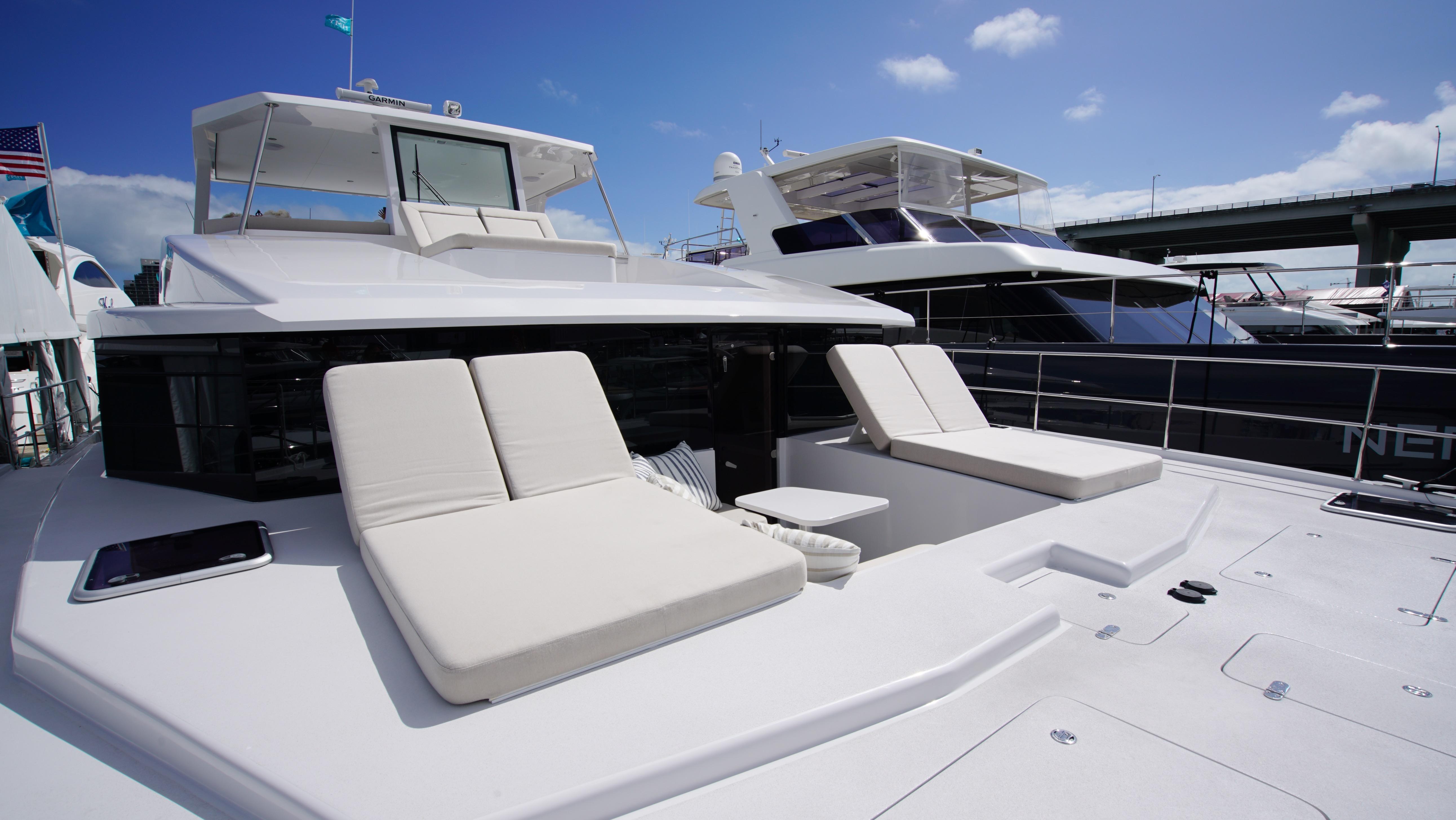 Two Oceans-555  008 2025 -FL-US-Luxurious 2025 Two Oceans 555 yacht with sun loungers, docked under clear blue sky.-9676126 | Thumbnail
