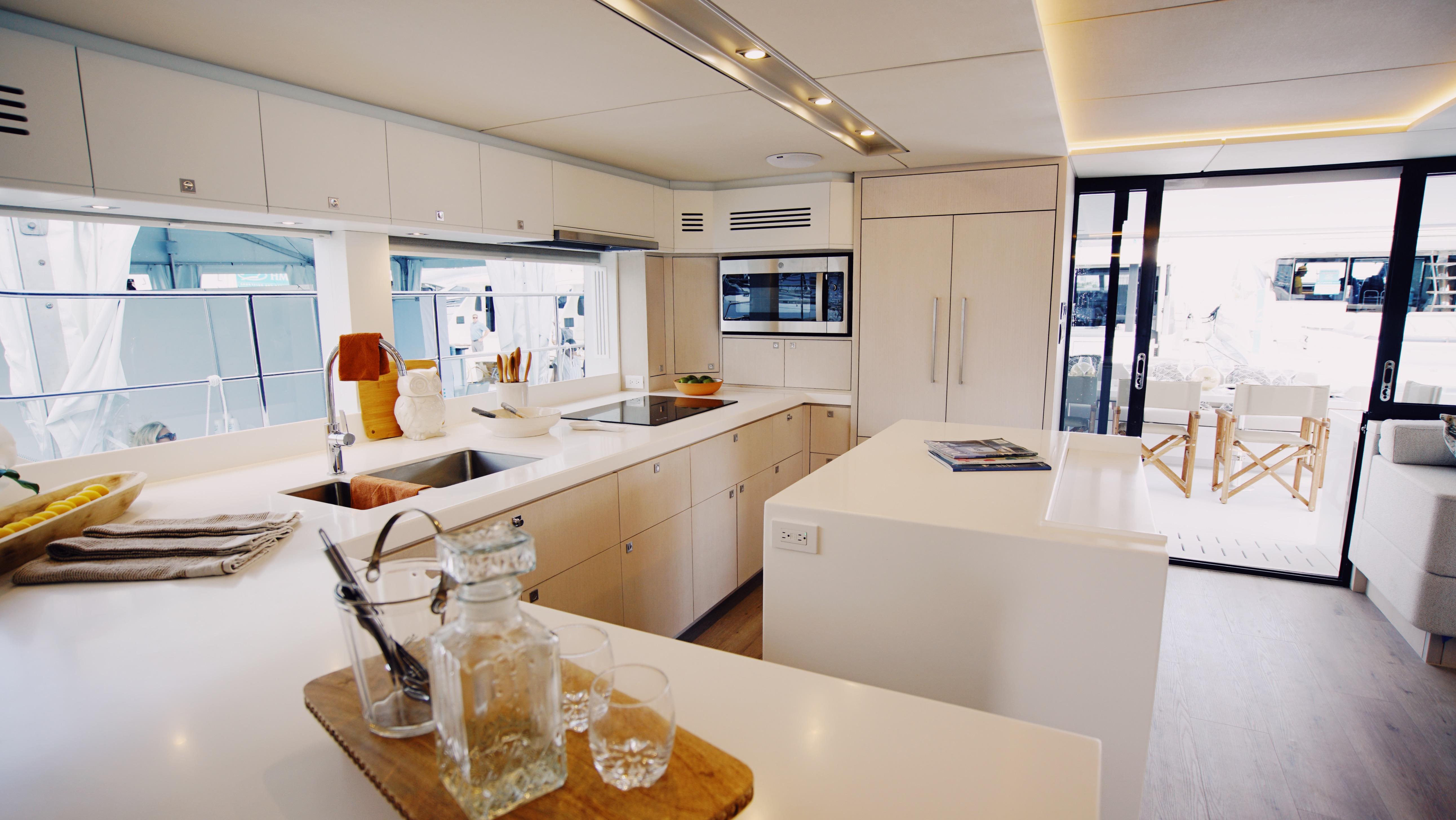 Two Oceans-555  008 2025 -FL-US-Luxurious yacht kitchen interior, Two Oceans 555  008, 2025 model, featuring modern design and amenities.-9676126 | Thumbnail