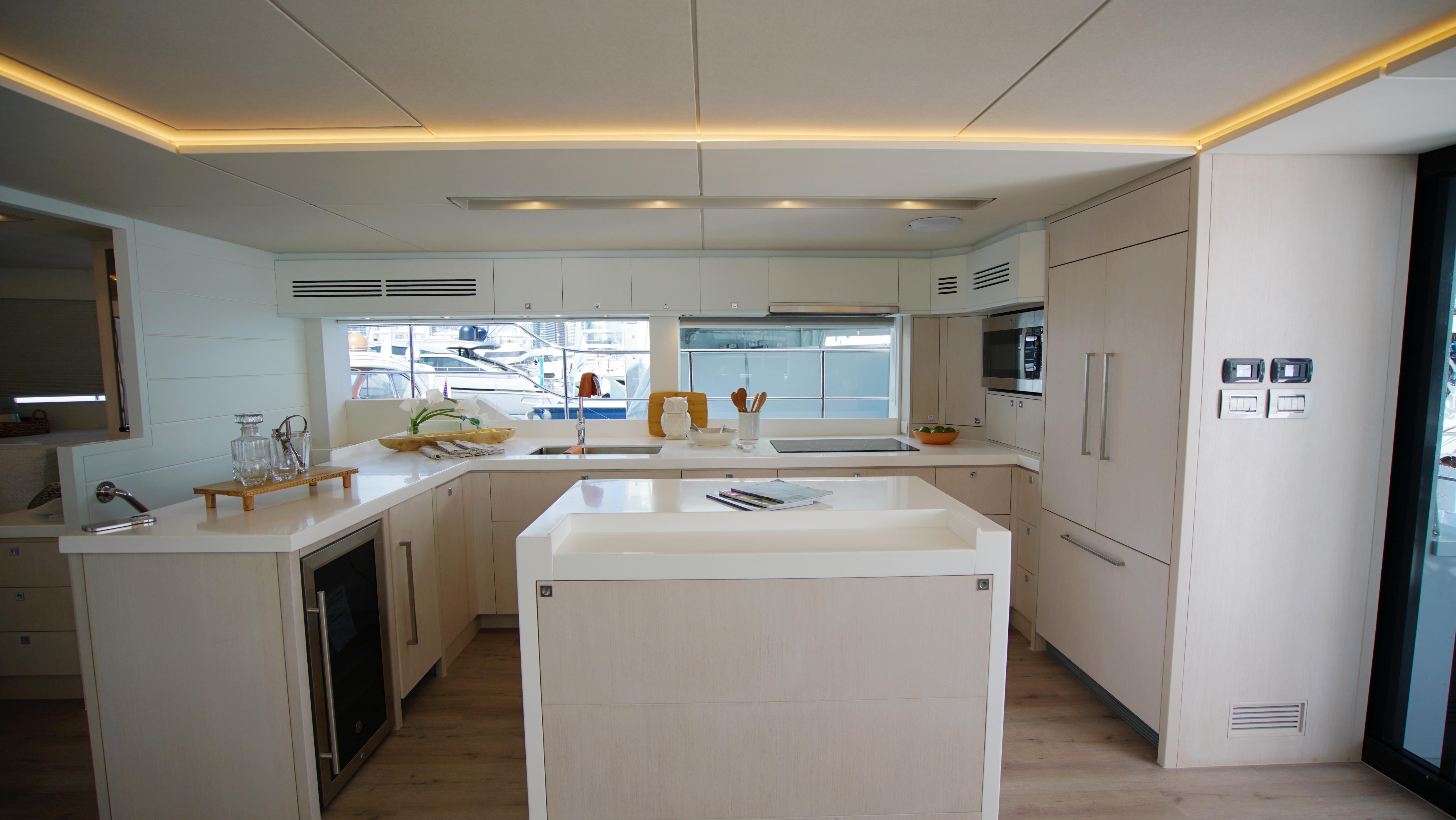 Two Oceans-555  008 2025 -FL-US-Luxurious yacht kitchen interior, Two Oceans 555  008, 2025 model, featuring modern design and amenities.-9676126 | Thumbnail
