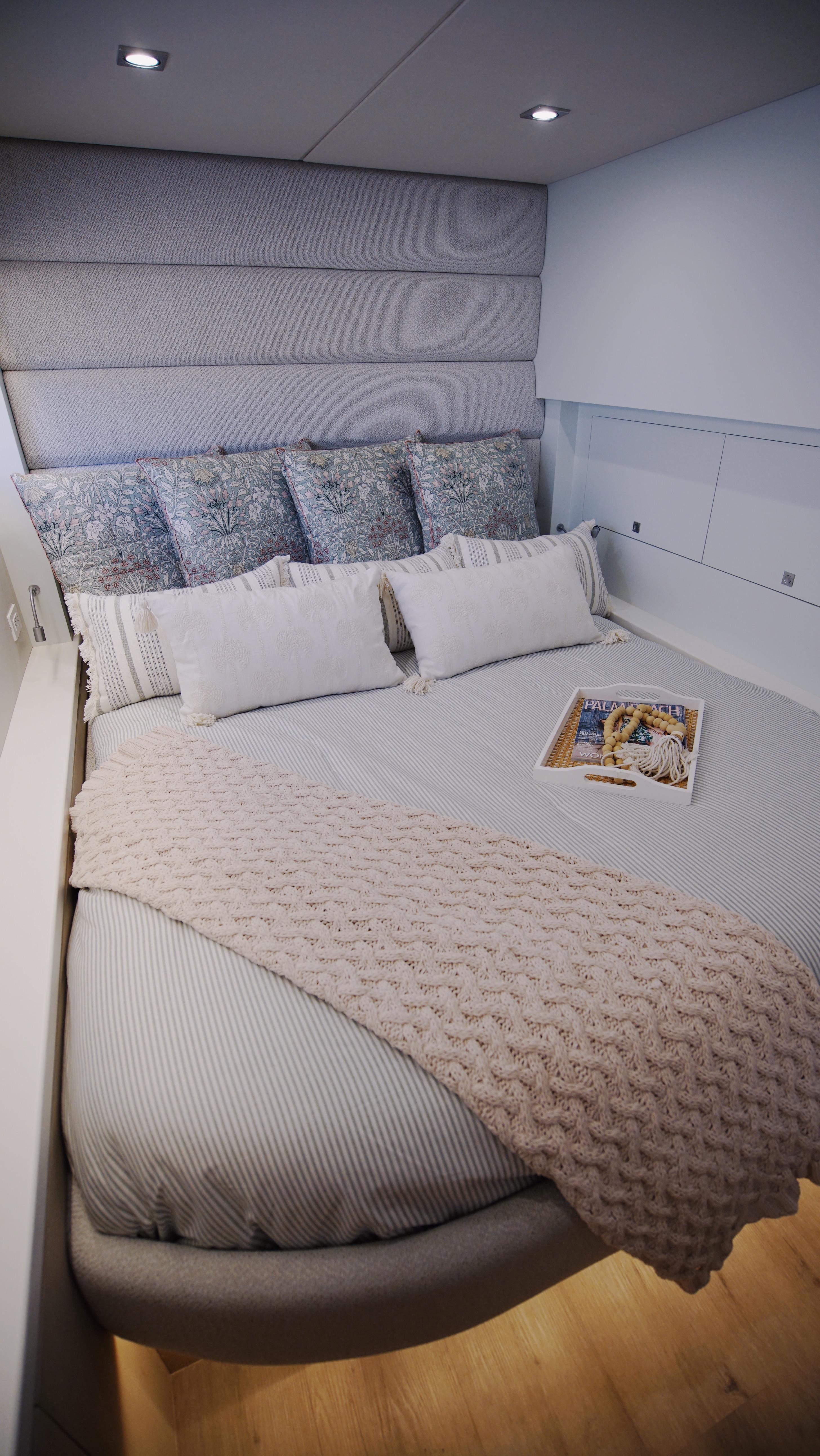 Two Oceans-555  008 2025 -FL-US-Luxurious bedroom interior in Two Oceans 555  008 yacht, featuring cozy bedding and elegant decor.-9676126 | Thumbnail
