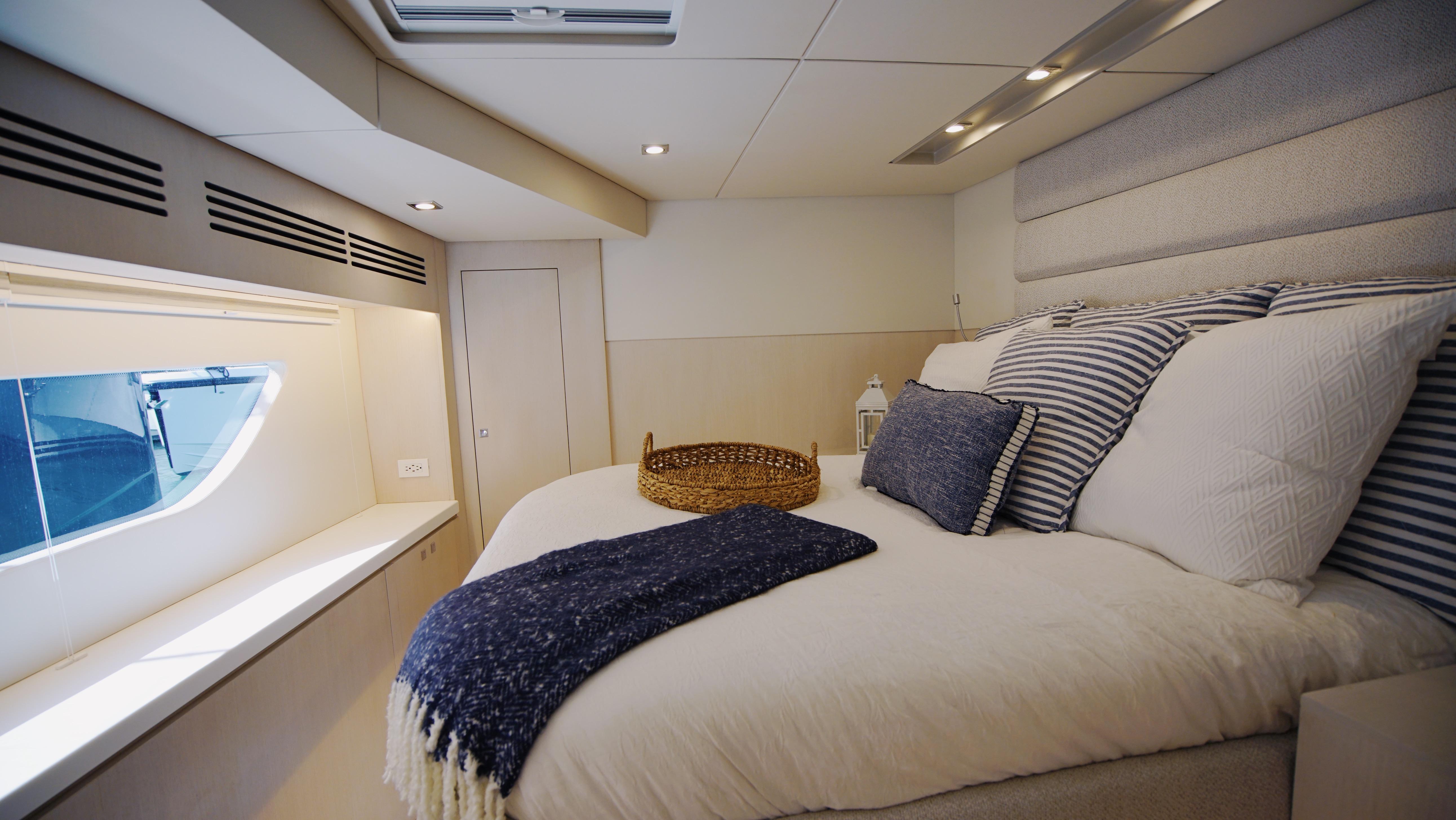 Two Oceans-555  008 2025 -FL-US-Luxurious bedroom interior of Two Oceans 555  008 yacht, 2025 model, with elegant bedding.-9676126 | Thumbnail