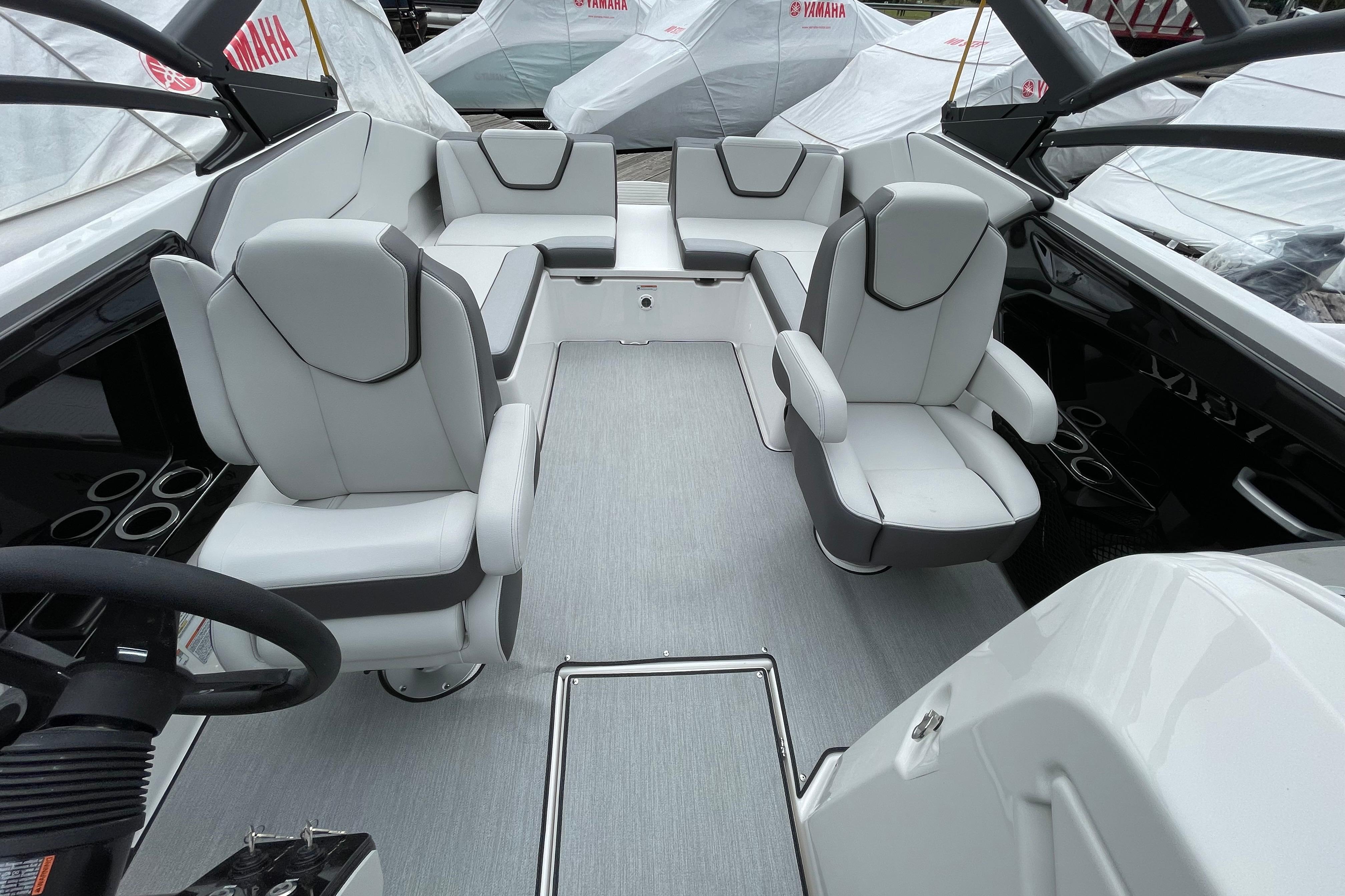 2026 Yamaha AR250 boat interior with modern seating and sleek design.