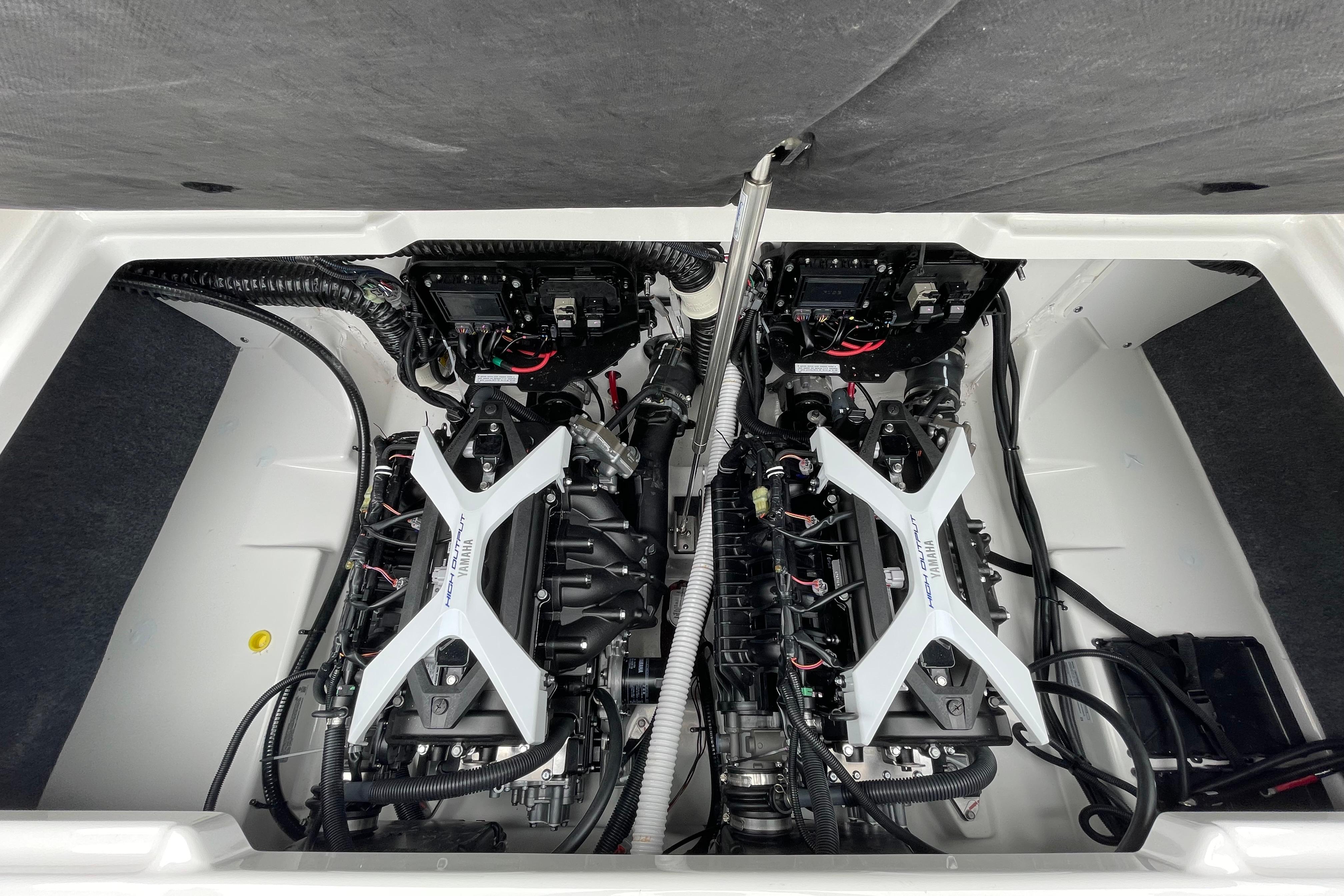 2026 Yamaha AR250 engine compartment showcasing dual engines and advanced wiring.