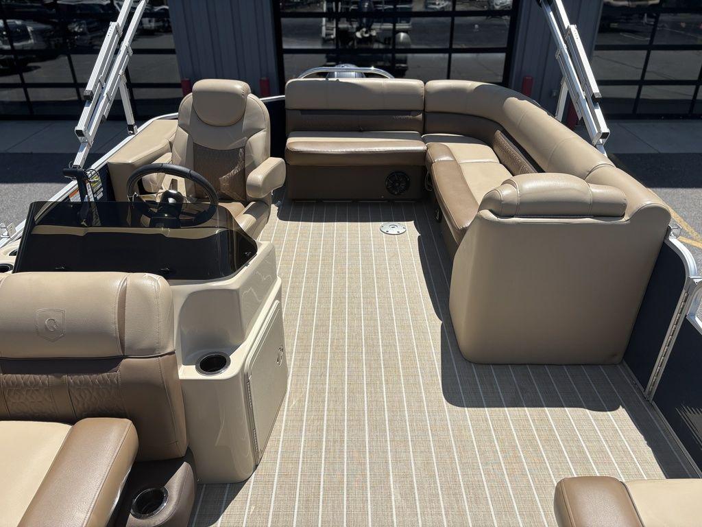 Luxurious 2021 Godfrey SW 2086 C pontoon boat interior with plush seating and modern helm.