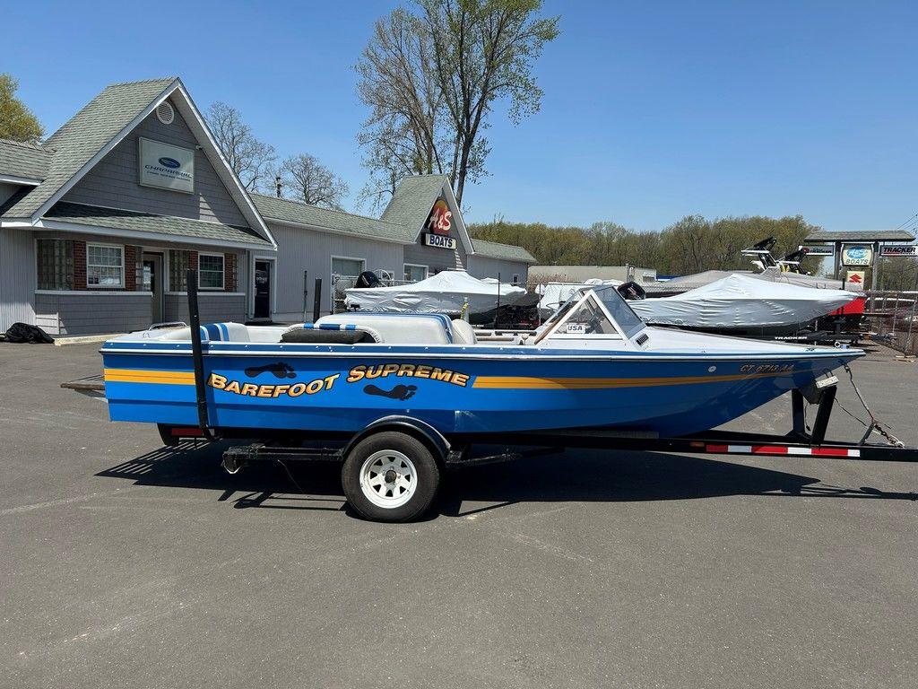 1980 Ski Supreme boat on trailer, blue with yellow 