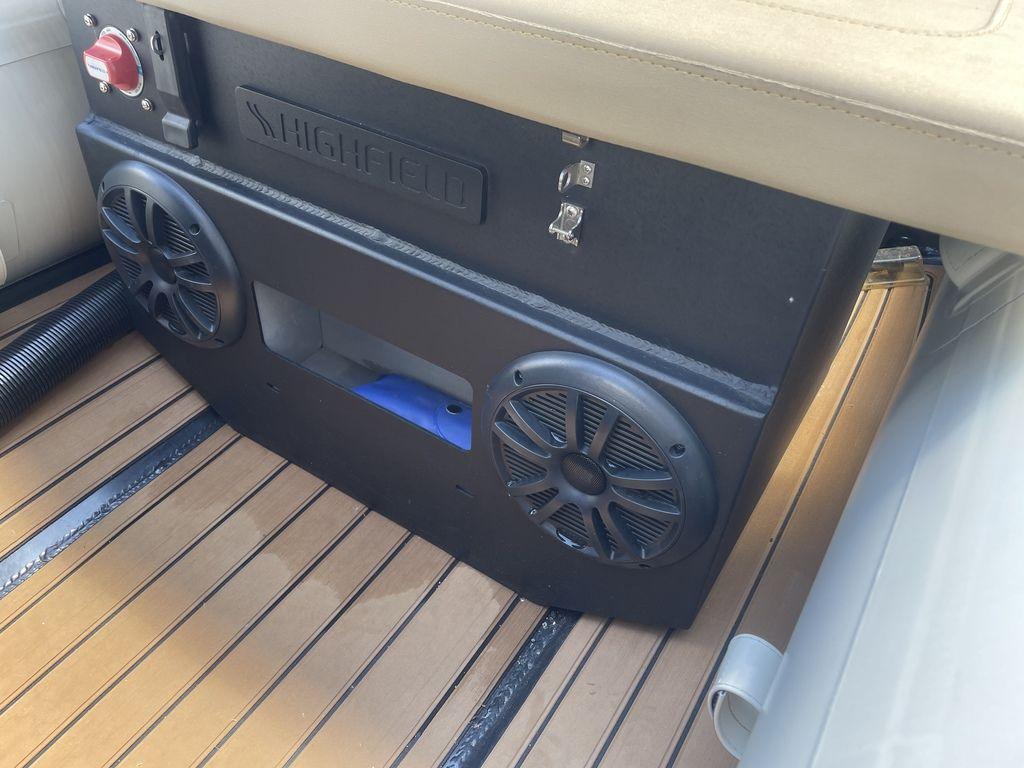 2023 Highfield Classic 380 GT Limited boat interior with speakers and teak flooring.