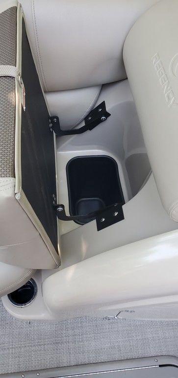 2017 Regency 220 DL3 boat seat with storage compartment and cup holder.