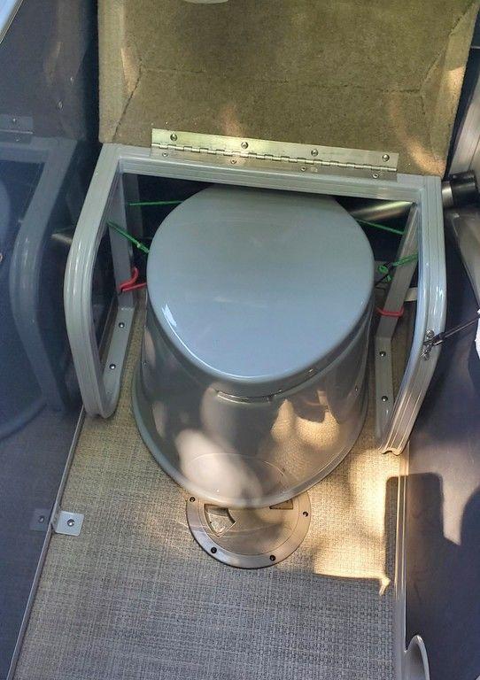 2017 Regency 220 DL3 boat toilet with compact design and secure mounting.