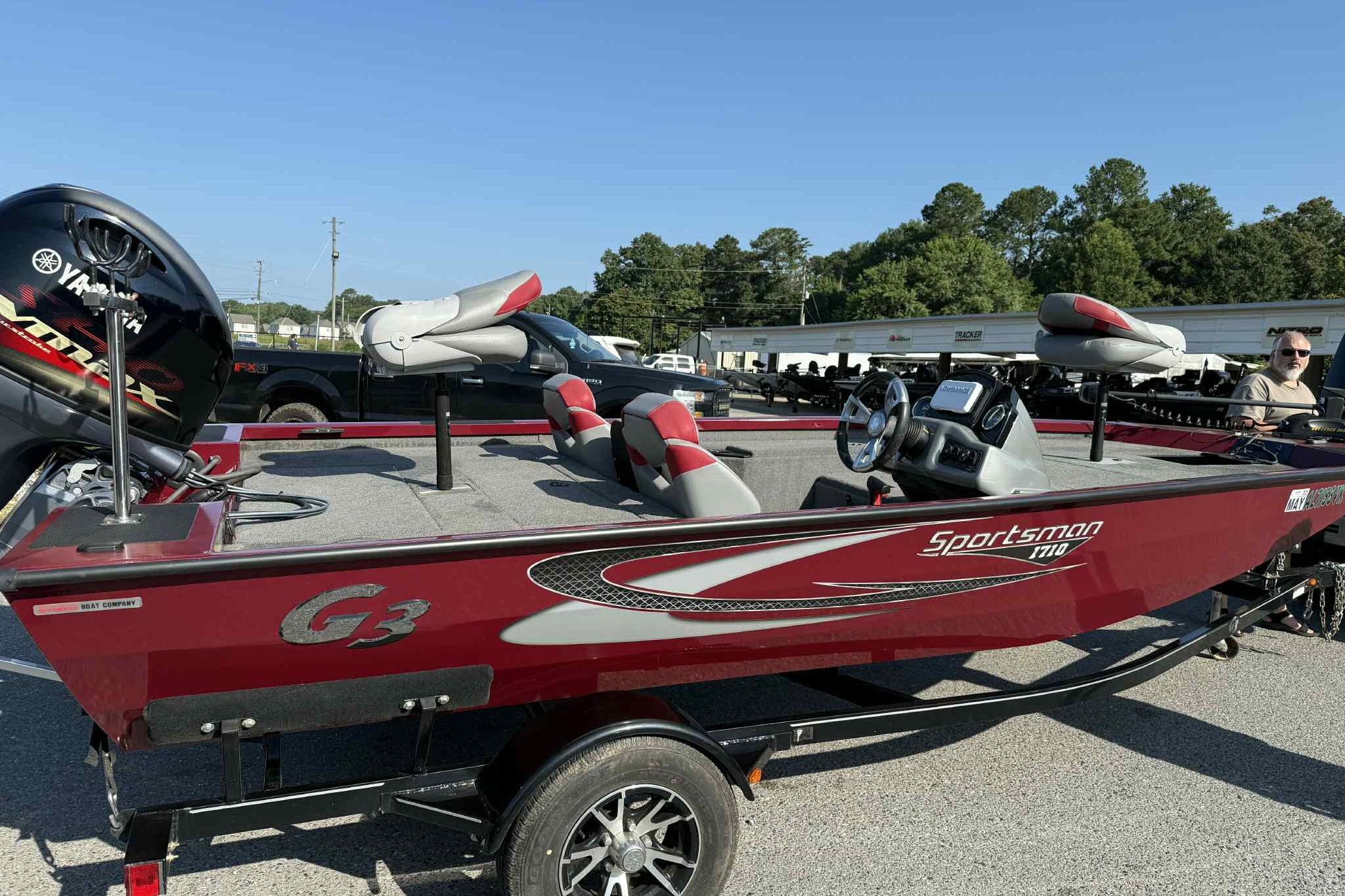 2020 G3 Sportsman 1710 boat with Yamaha engine, parked outdoors on a trailer.