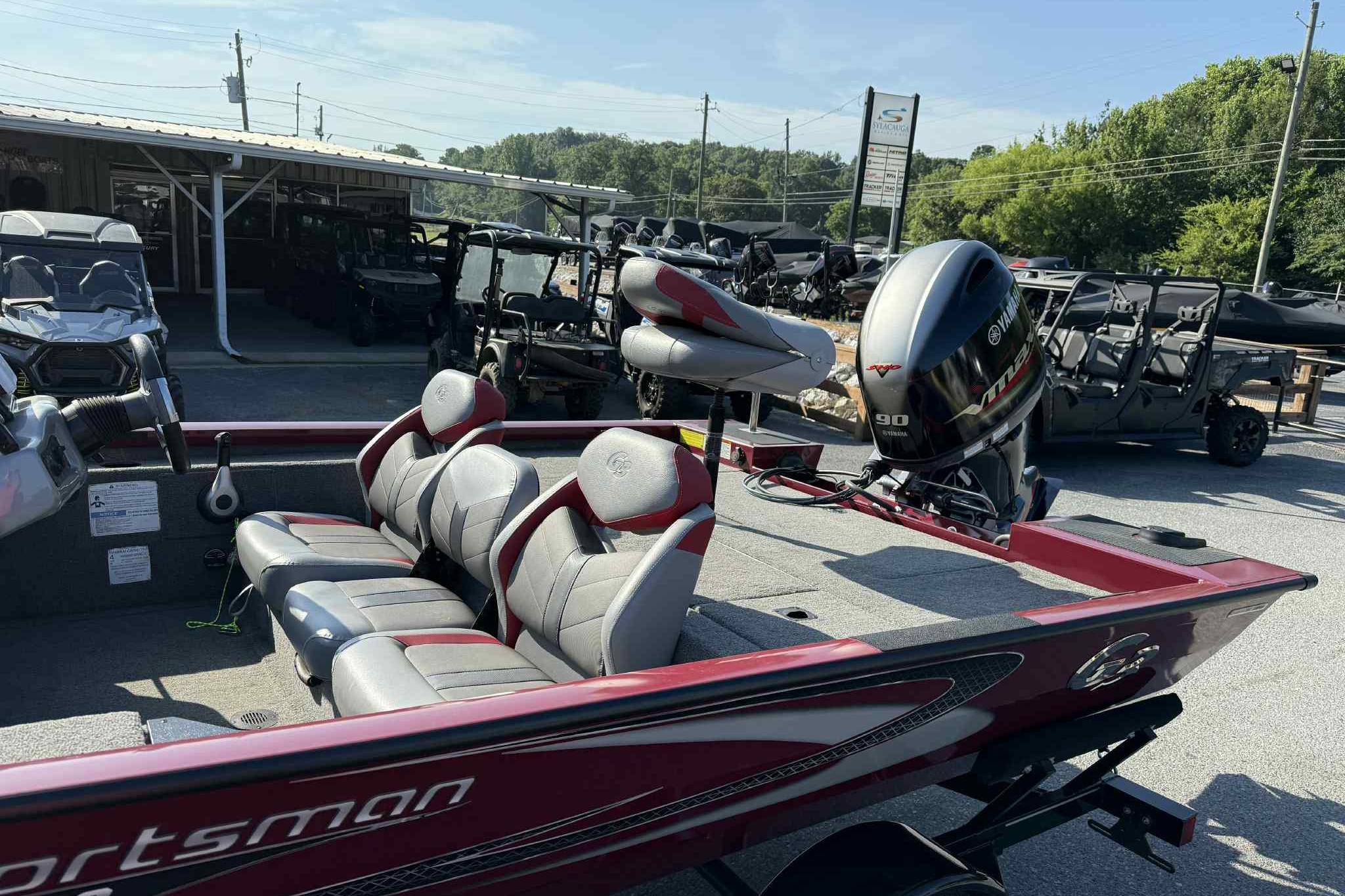 2020 G3 Sportsman 1710 boat with Yamaha engine, parked outdoors.