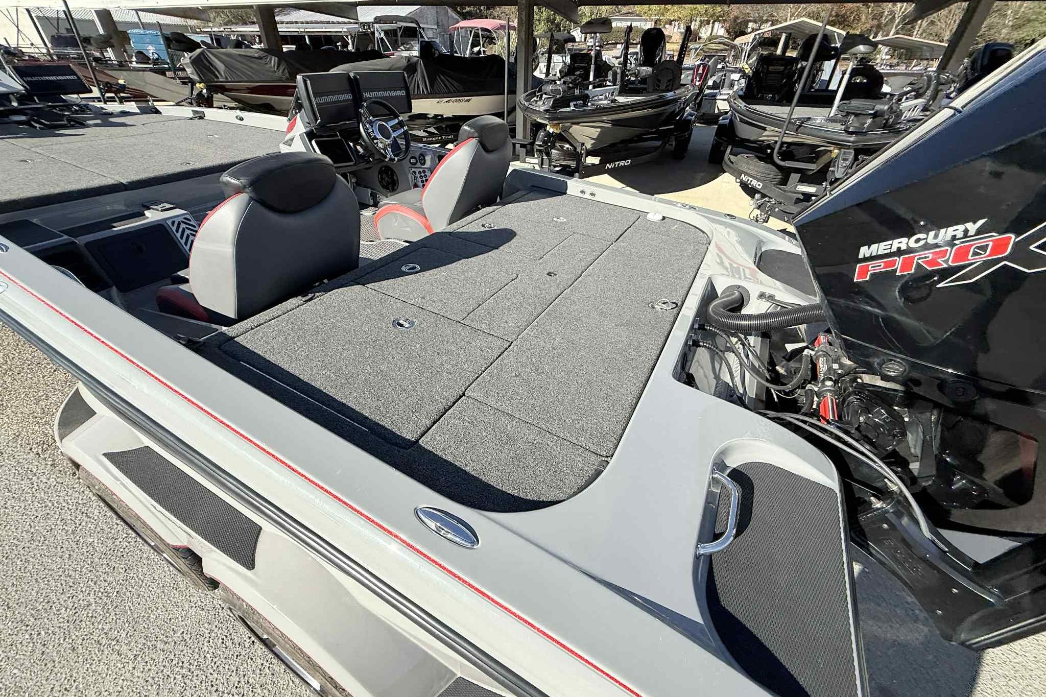 2022 Caymas CX20PRO boat with Mercury Pro XS engine, featuring spacious deck and dual seats.