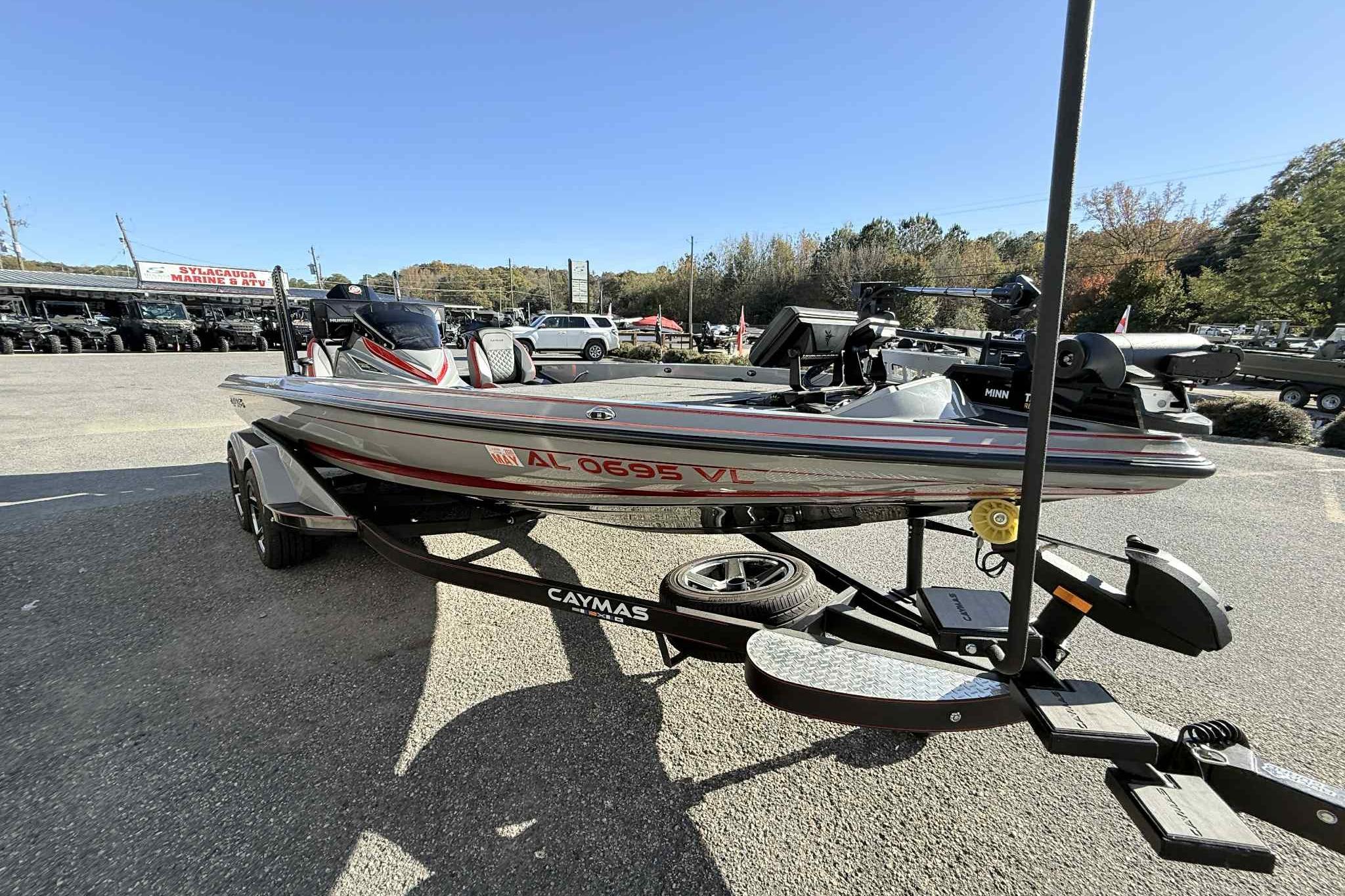 2022 Caymas CX20PRO boat on trailer in outdoor dealership lot.