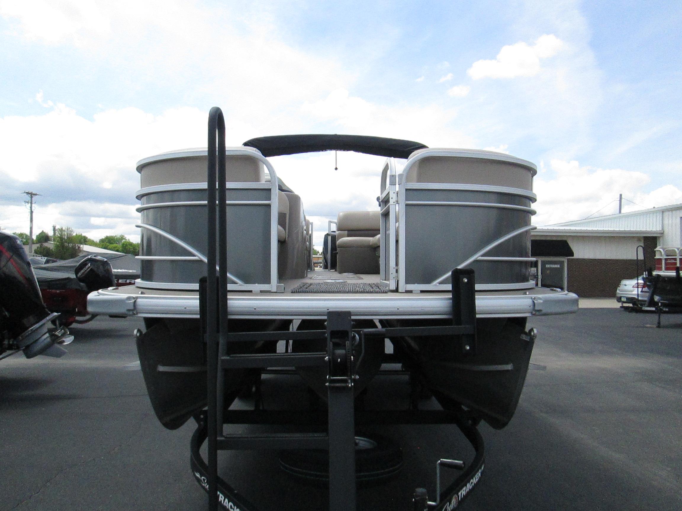 2023 Sun Tracker PARTY BARGE 22RF XP3 pontoon boat on trailer, rear view.