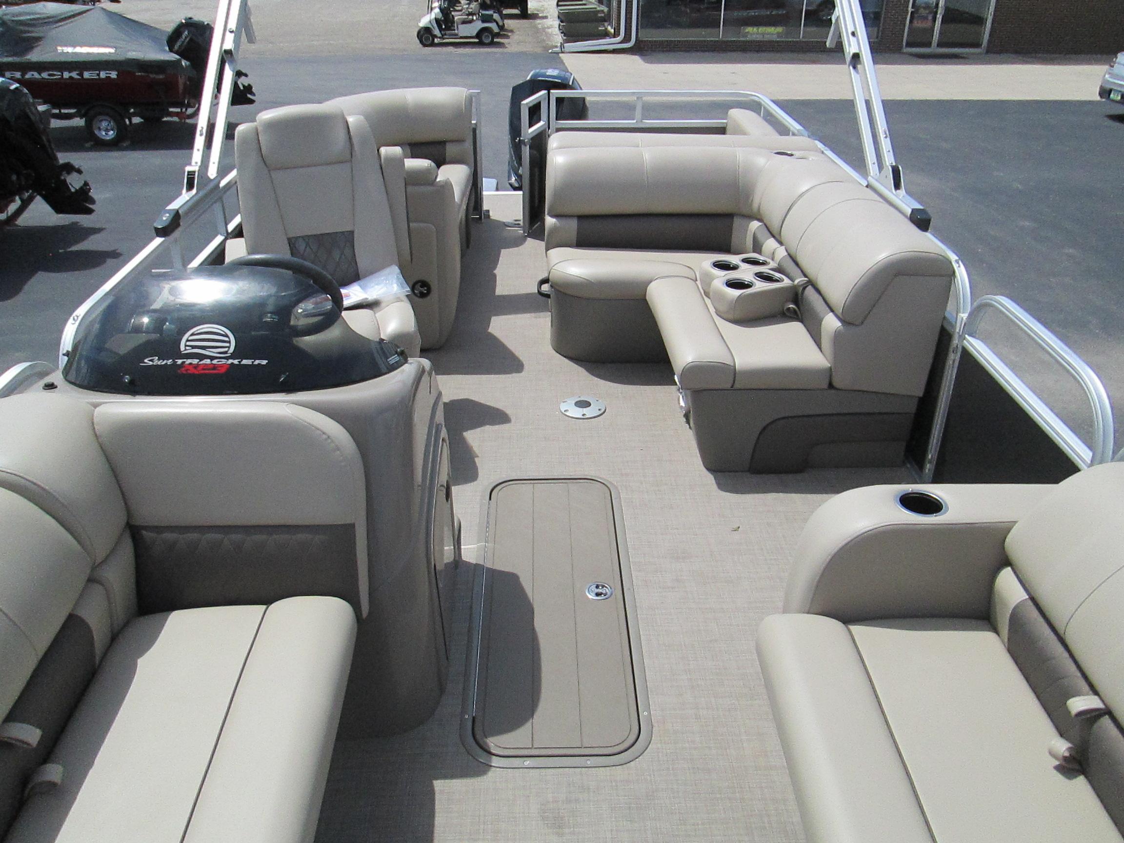 2023 Sun Tracker PARTY BARGE 22RF XP3 pontoon boat with spacious seating and modern design.