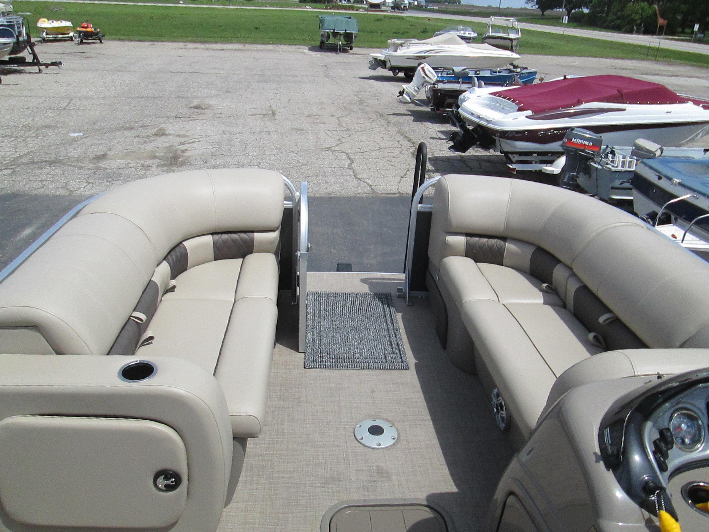 2023 Sun Tracker PARTY BARGE 22RF XP3 pontoon boat with spacious seating and modern design.