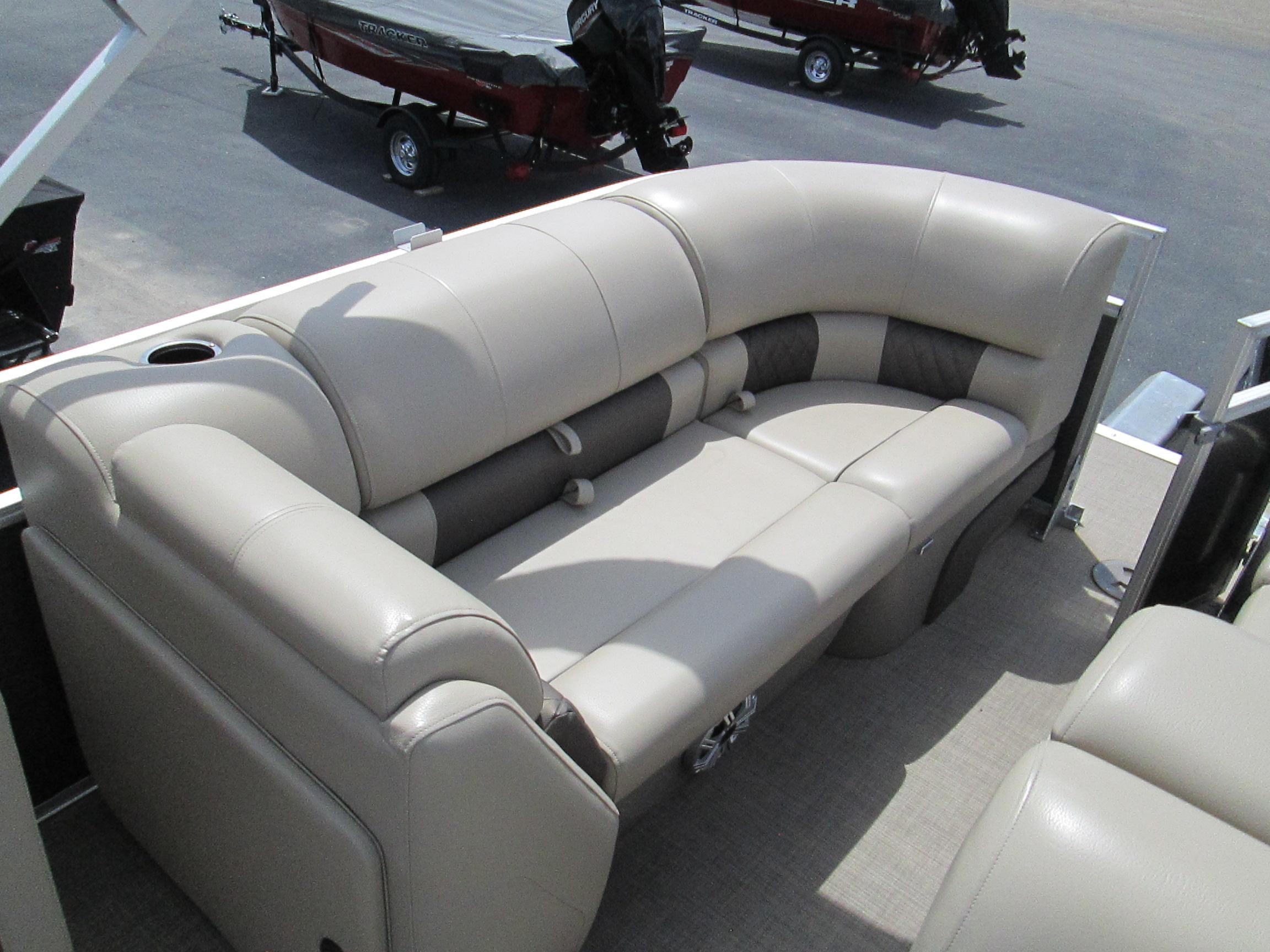 2023 Sun Tracker PARTY BARGE 22RF XP3 pontoon boat seating, beige upholstery, spacious and comfortable design.