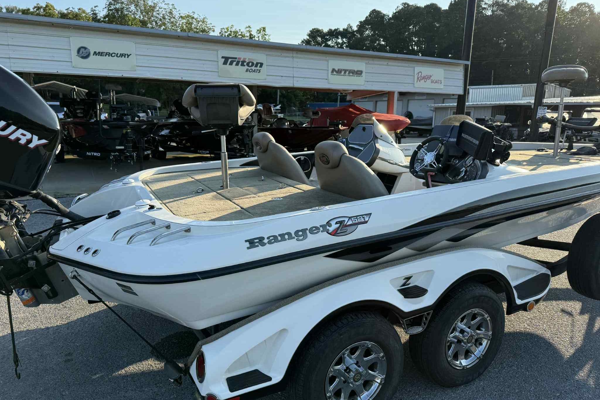 2012 Ranger Z521 Comanche boat with Mercury engine at dealership.