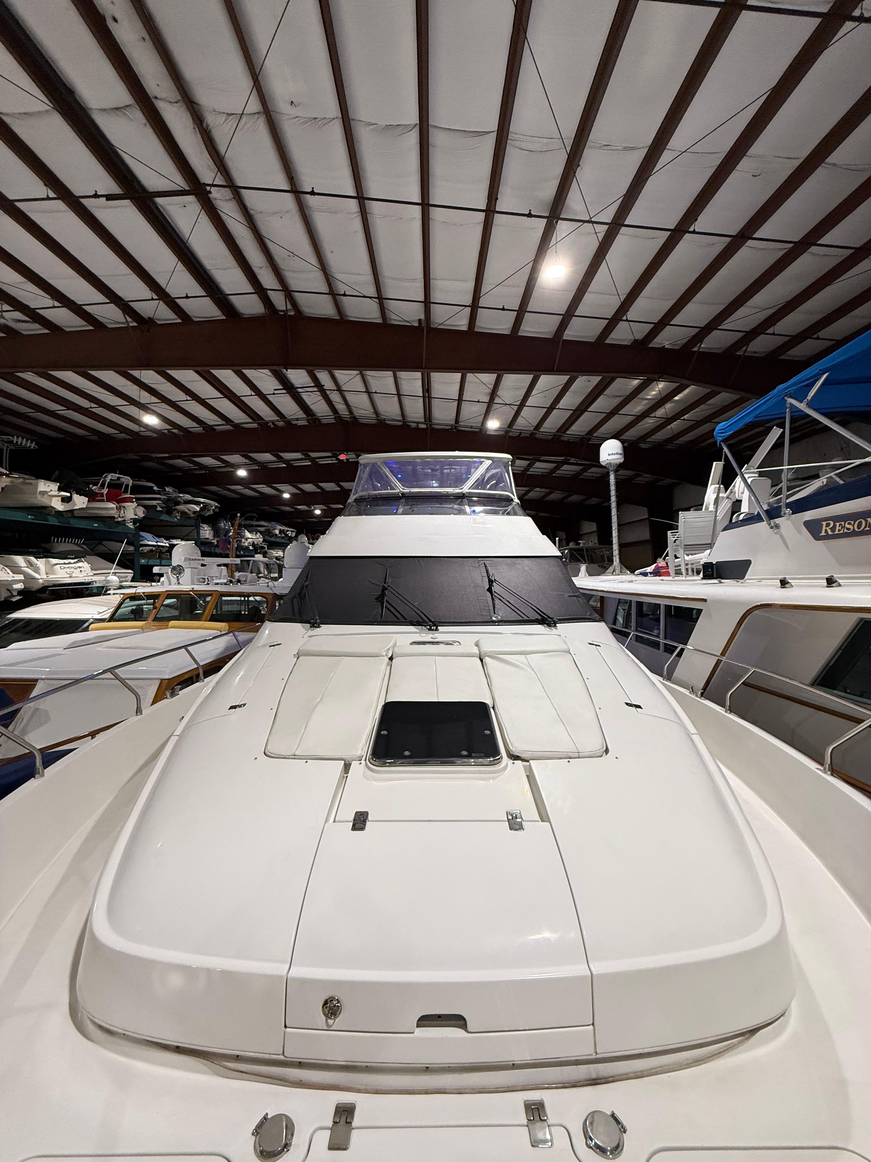 Marquis-65 2005-Tenacity FL-US-2005 Marquis 65 yacht in storage, showcasing sleek design and spacious deck.-9656261 | Thumbnail
